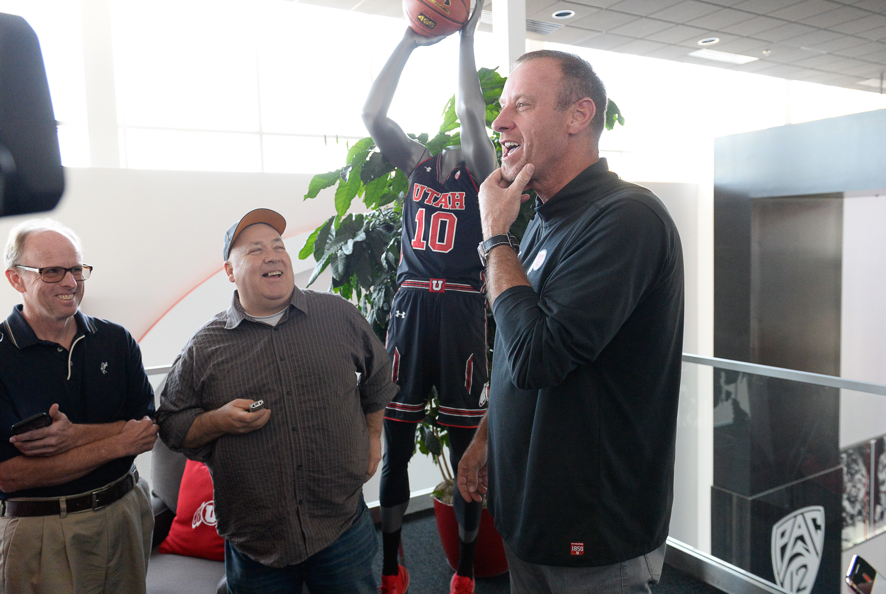 (Francisco Kjolseth | The Salt Lake Tribune) Utah basketball coach Larry Krystkowiak jokes around with the press during media day at the Ute basketball practice facility on Wed. Sept. 26, 2018.