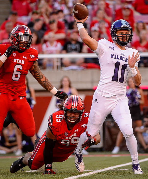 (Trent Nelson | The Salt Lake Tribune) Weber State Wildcats quarterback Kaden Jenks (11) passes the ball as the University of Utah Utes host the Weber State Wildcats, Thursday Aug. 30, 2018 at Rice-Eccles Stadium in Salt Lake City.