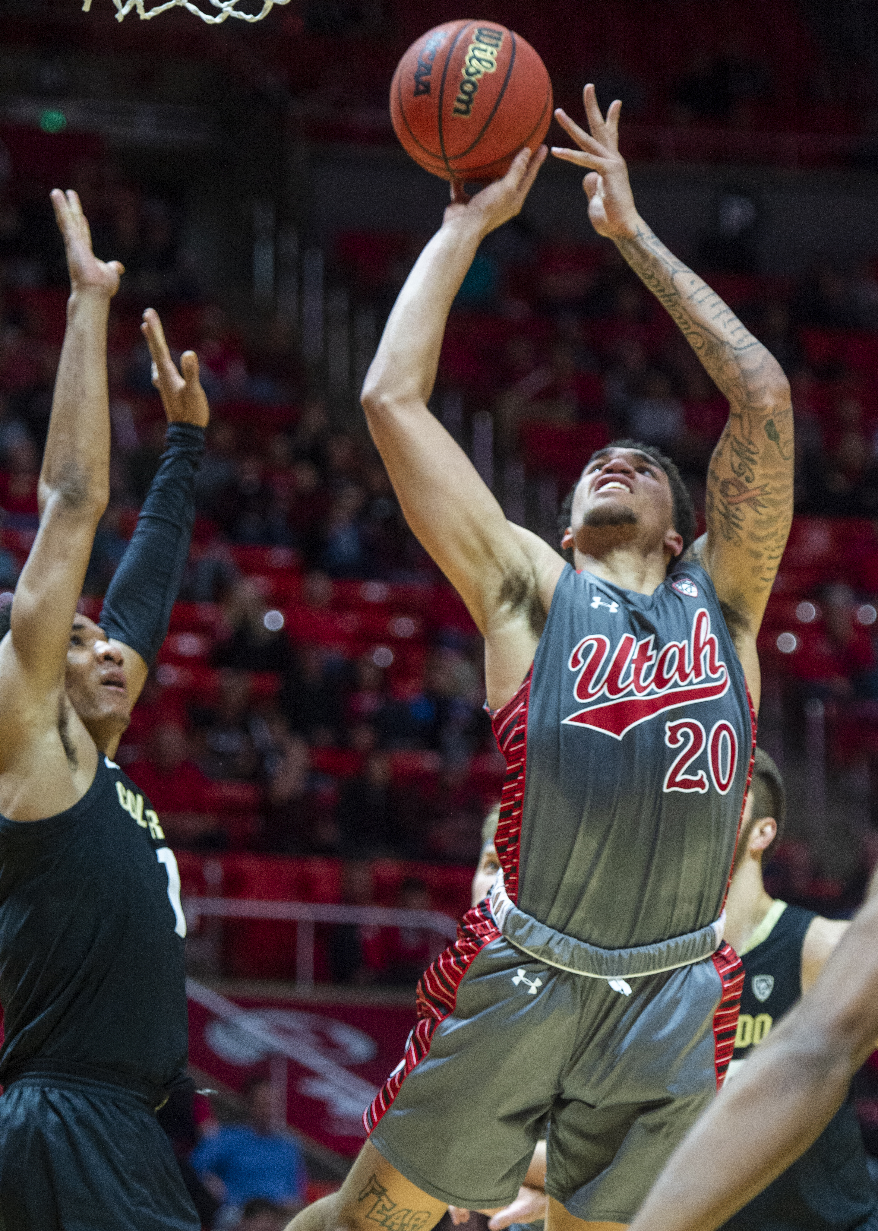 (Rick Egan | The Salt Lake Tribune) Utah Utes forward Timmy Allen (20) goes in for a shot in PAC-12 basketball action between the Utah Utes and the Colorado Buffaloes at the Jon M. Huntsman Center, Sunday, Jan. 20, 2019. 
