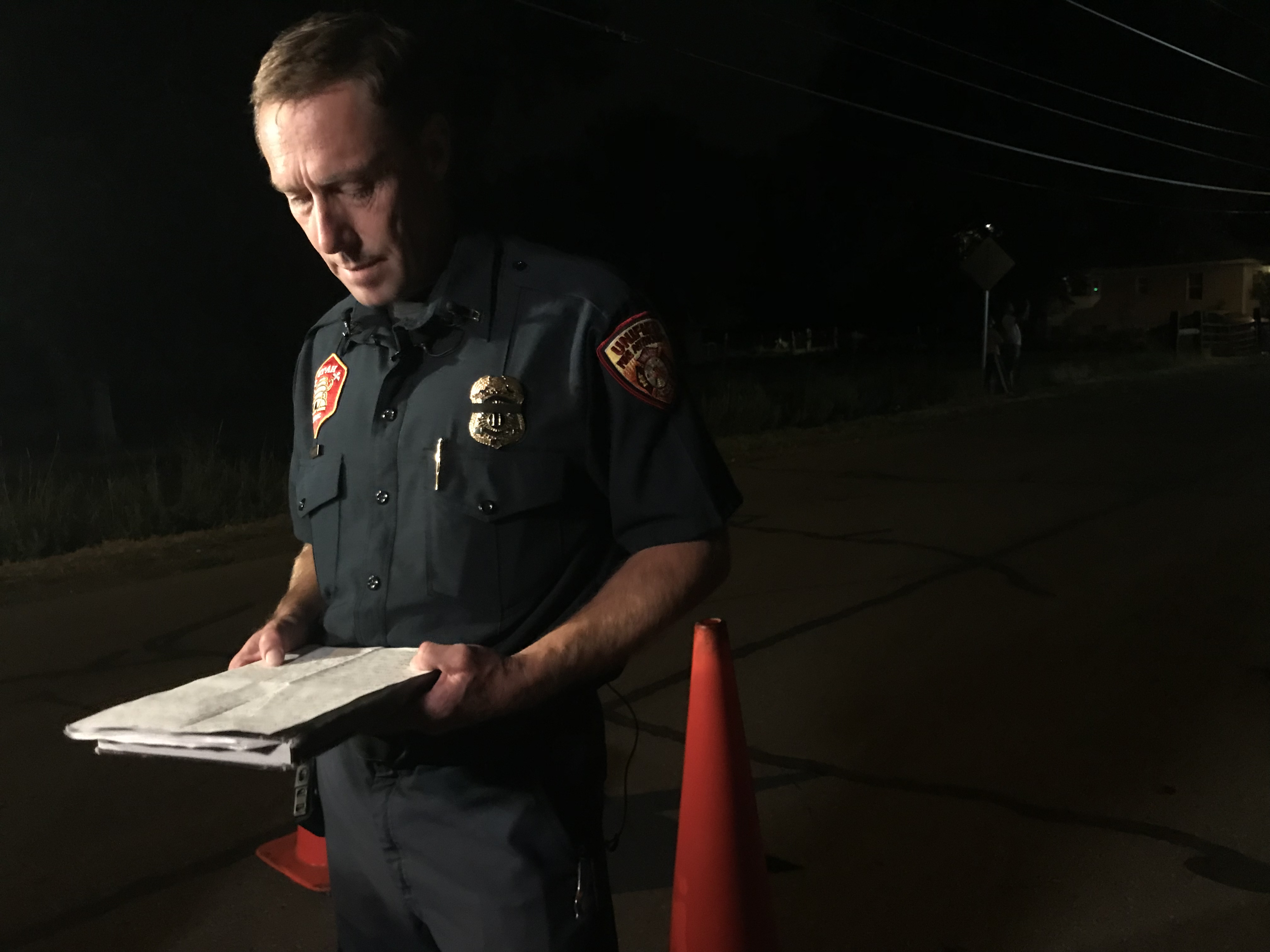 (Paighten Harkins | The Salt Lake Tribune) Unified Fire Capt. Jay Torgersen reads a statement from Draper Fire Battalion Chief Matt Burchett's family on Wednesday, Aug. 15, 2018, in South Jordan.