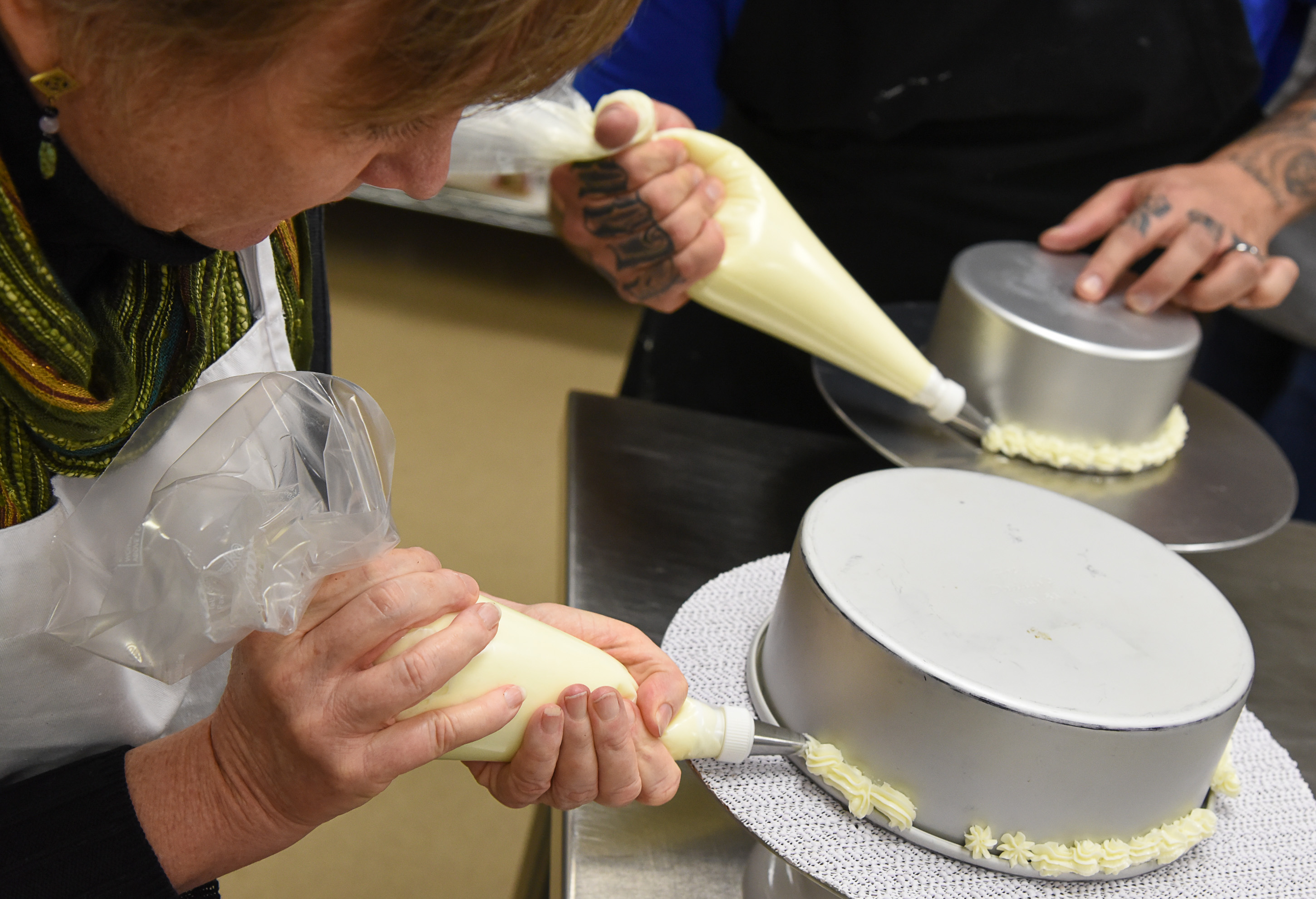 (Francisco Kjolseth | The Salt Lake Tribune) Learning a new craft, actress Betsy West prepares for an upcoming role of a Southern Baptist bakery owner in North Carolina faced with a request to bake a cake for a gay couple getting married for Salt Lake Acting Company's production of "The Cake." A self admitted baking novice, West, in search of better authenticity in portraying her role received a one-on-one lesson from the chef's at Flourish.