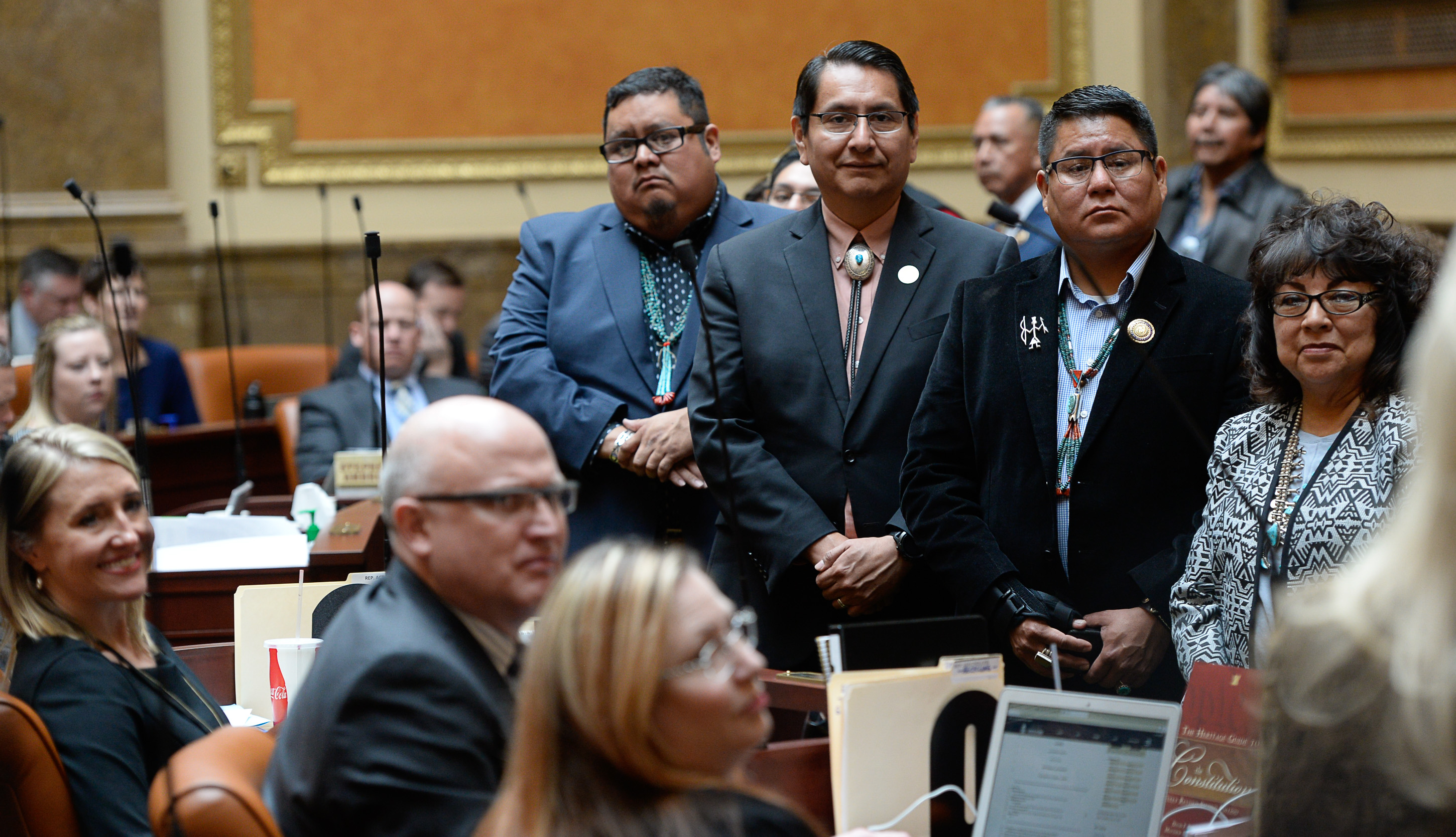 (Francisco Kjolseth | The Salt Lake Tribune) Seth Damon, Jonathan Nez, Nathaniel Brown and Shirlee Silversmith, from left, stand in the House floor as the Utah lawmakers on Monday unanimously passed a resolution honoring the Navajo Code Talkers and dedicating Aug. 14, 2019, to the World War II service members whose unbreakable code boosted the U.S. Marine Corps in the Pacific Theater.