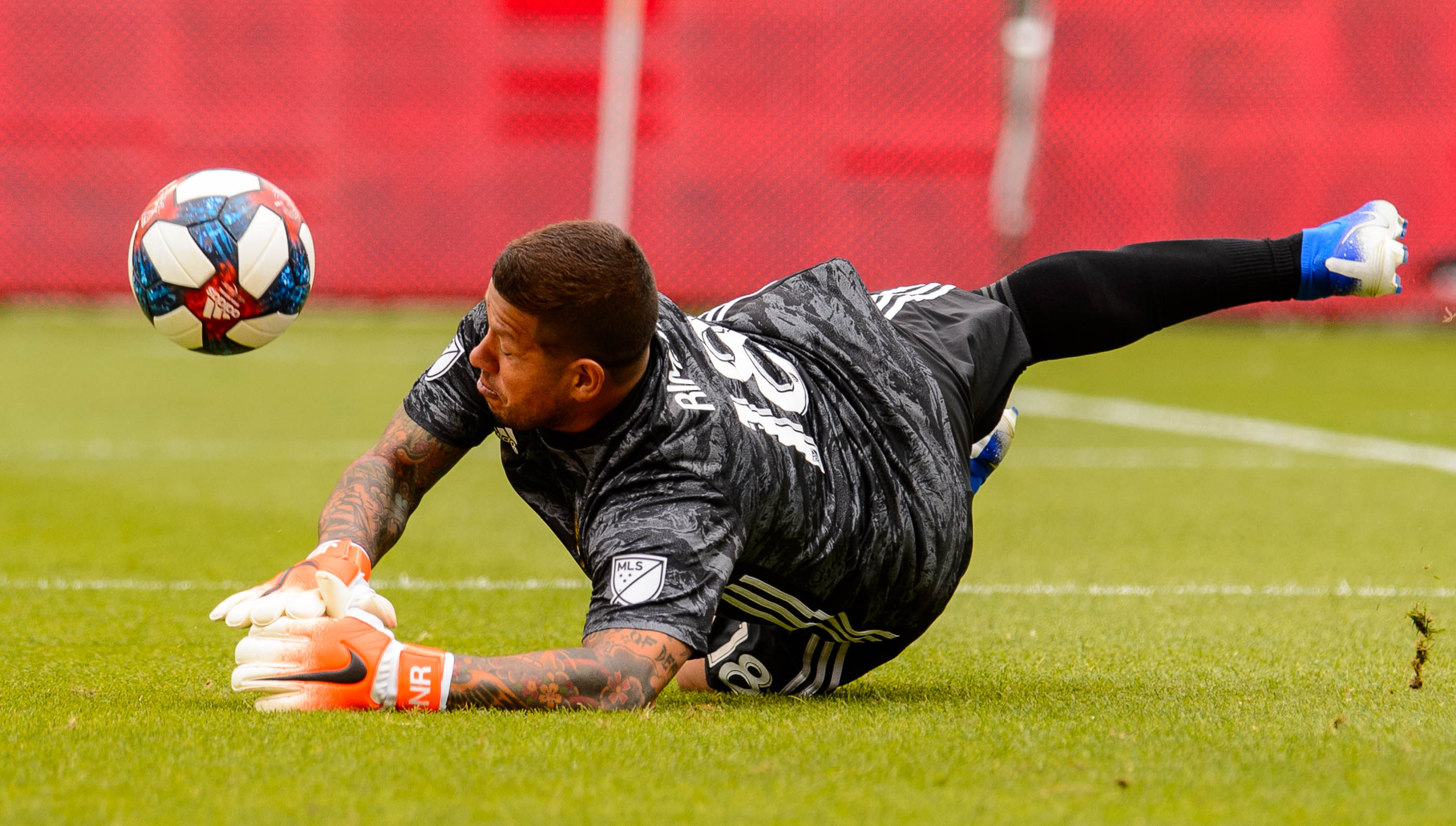 (Trent Nelson | The Salt Lake Tribune) Real Salt Lake goalkeeper Nick Rimando (18) makes a save as Real Salt Lake hosts Toronto FC, MLS Soccer at Rio Tinto Stadium in Sandy on Saturday May 18, 2019.
