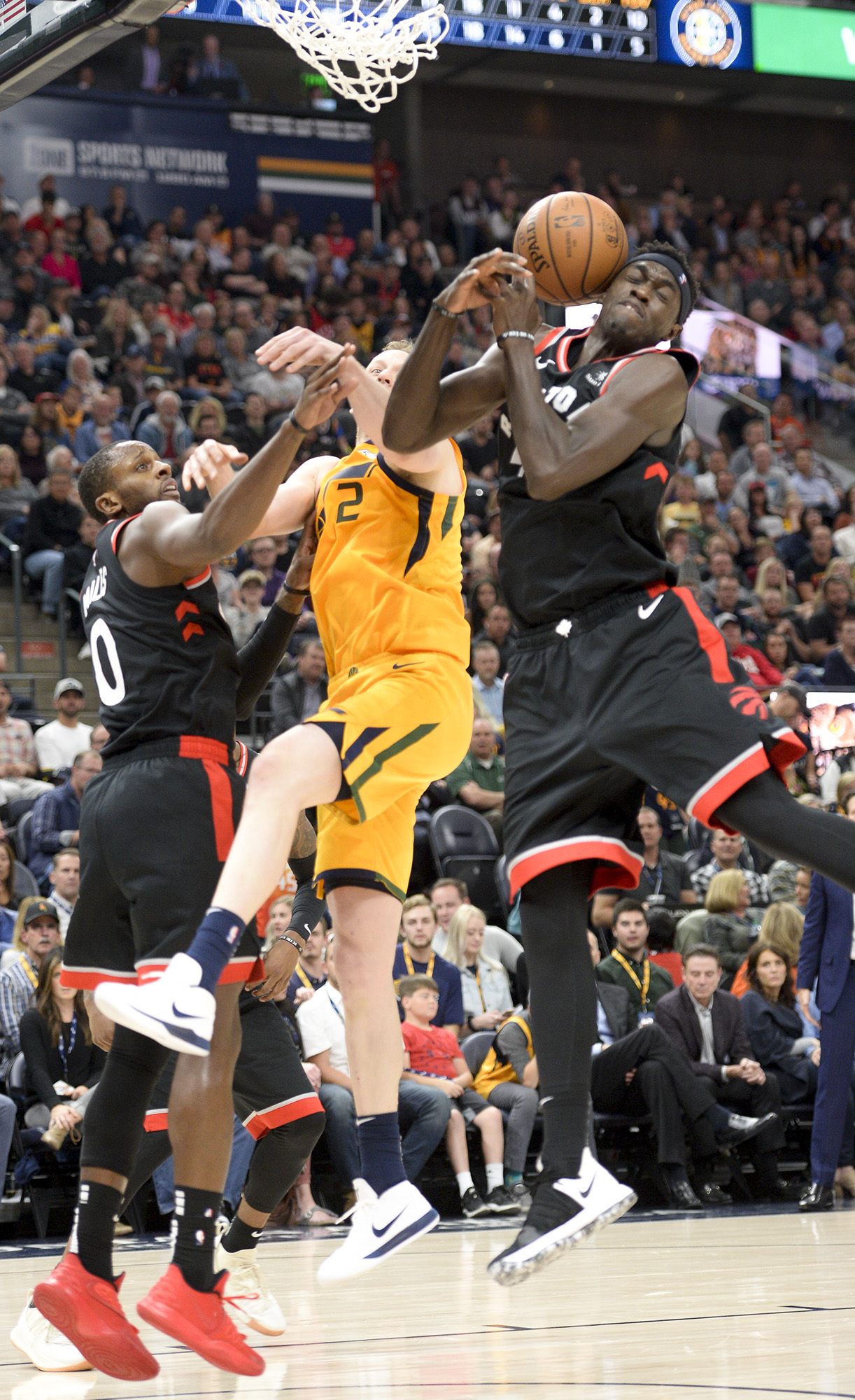 Leah Hogsten | The Salt Lake Tribune Utah Jazz forward Joe Ingles (2) battles Toronto Raptors forward CJ Miles (0) and Toronto Raptors forward Pascal Siakam (43) the Utah Jazz host the Toronto Raptors, Monday, Nov. 5, 2018 at Vivant Smart Home Arena.