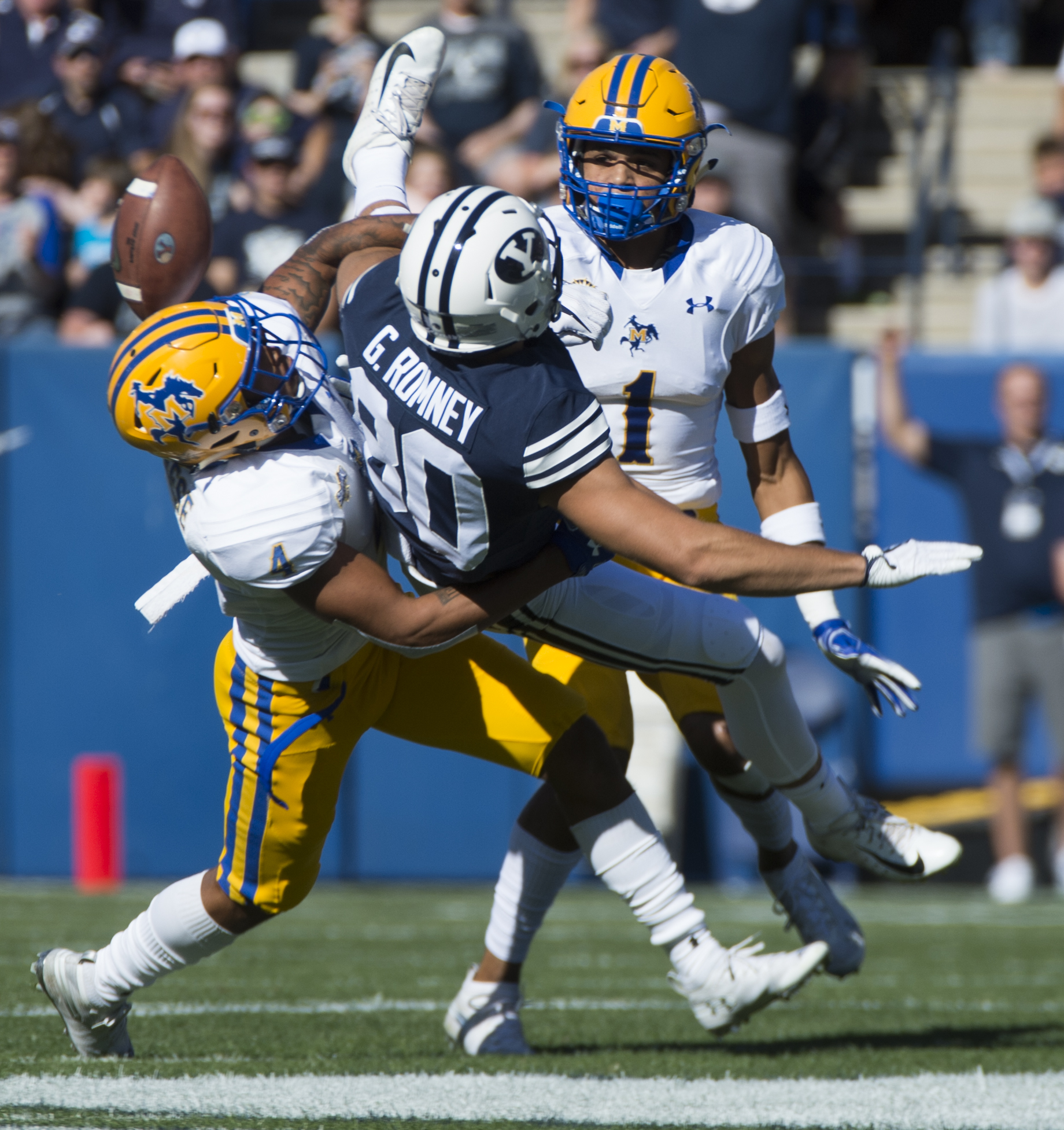 (Rick Egan | The Salt Lake Tribune) McNeese State Cowboys defensive back Colby Burton (4) deflects a pass intended for Brigham Young Cougars wide receiver Gunner Romney (80), in football action between Brigham Young Cougars and McNeese State Cowboys, at Lavell Edwards Stadium, Saturday, Sept. 22, 2018. 