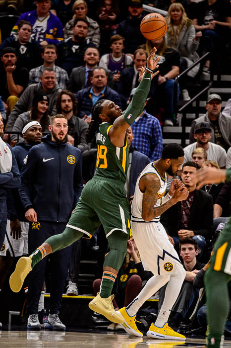 (Trent Nelson | The Salt Lake Tribune) Utah Jazz forward Jae Crowder (99) makes an improbable shot as he's fouled by Denver Nuggets guard Will Barton (5) as the Utah Jazz host the Denver Nuggets, NBA basketball in Salt Lake City on Wednesday Jan. 23, 2019.