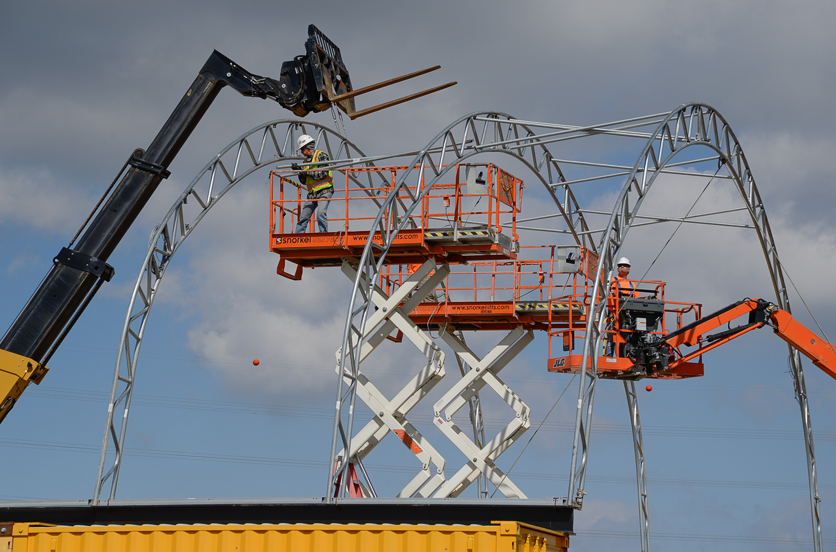 (Francisco Kjolseth | The Salt Lake Tribune) Crews begin building a storage facility near 5600 West and the S.R. 201 as part of the Utah Department of Transportation's top construction project which will link the Mountain View Corridor from 4100 South to S.R. 201. The $335 million four-mile project, includes four lanes (two in each direction) and 13 new bridges.