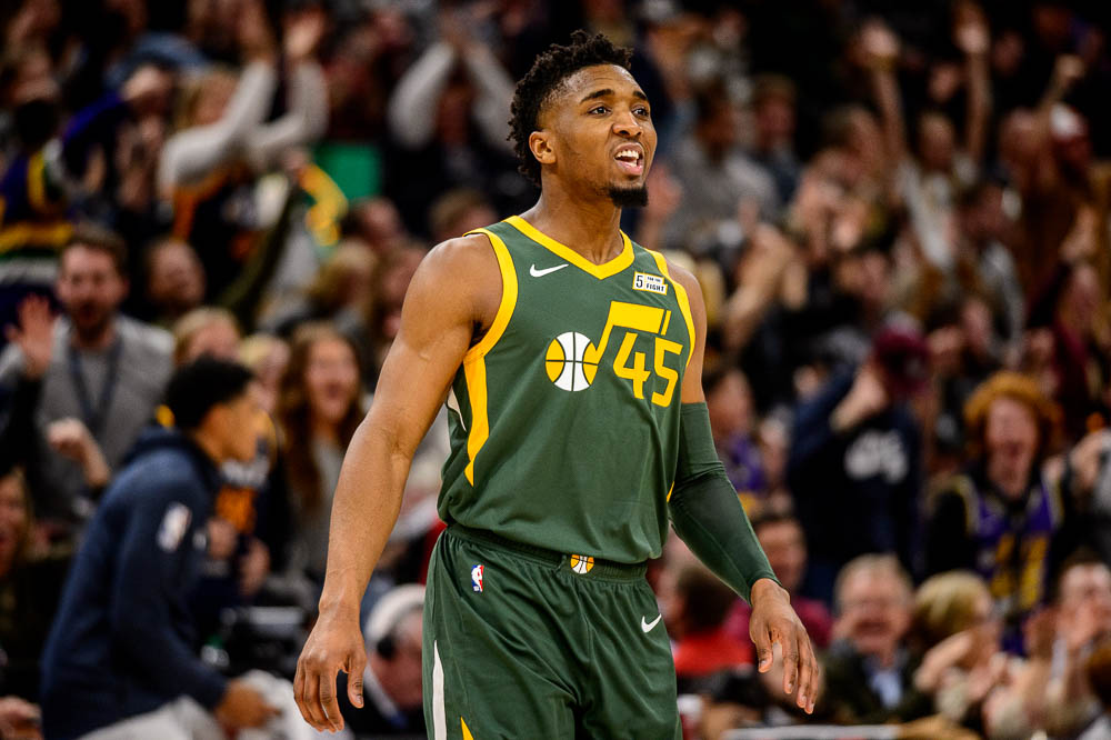 (Trent Nelson | The Salt Lake Tribune) Utah Jazz guard Donovan Mitchell (45) celebrates a three-pointer as the Utah Jazz host the Denver Nuggets, NBA basketball in Salt Lake City on Wednesday Jan. 23, 2019.