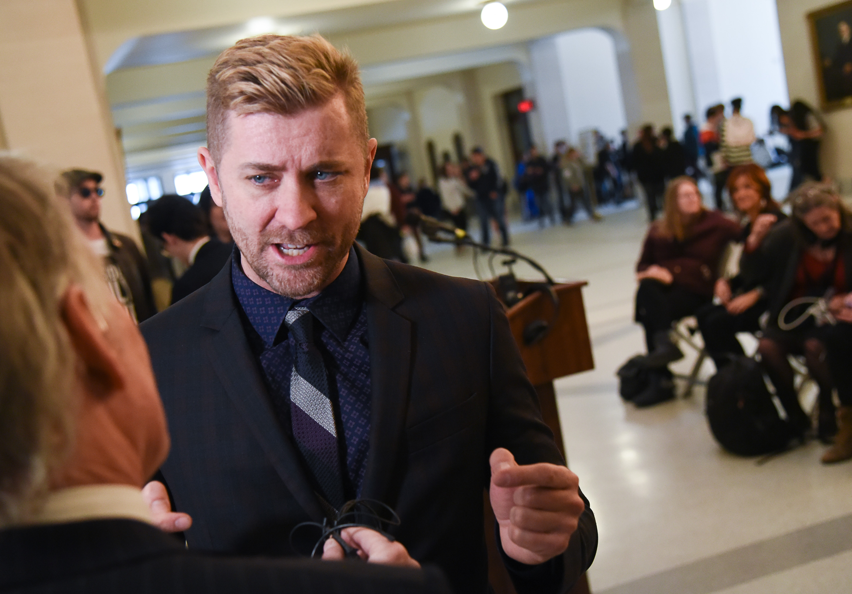 (Francisco Kjolseth | The Salt Lake Tribune) Troy Williams, Executive Director of Equality Utah gives an interview before a press event at the Utah Capitol on Thursday, Feb. 21, 2019, to introduce legislation by Rep. Craig Hall, R-West Valley, and Sen. Dan McCay, R-Riverton, to ban conversion therapy.