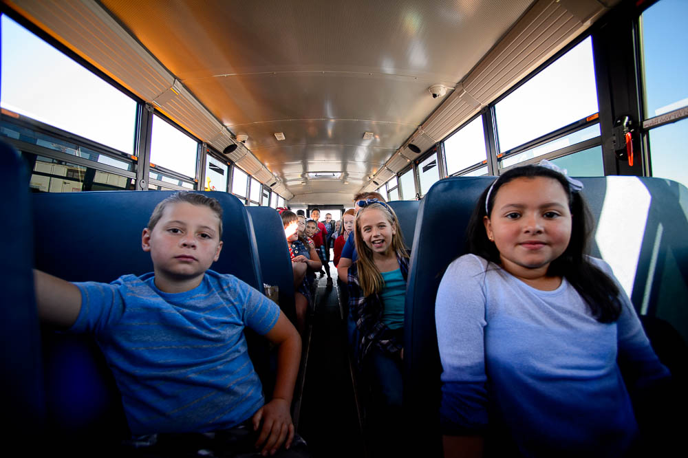 (Trent Nelson | The Salt Lake Tribune) Fourth graders from Terra Linda Elementary arrive at a news conference introducing thirty-six new CNG school buses have been added to the Jordan School District fleet this year, bringing the total to 105, the largest fleet of CNG school buses in Utah. Wednesday Sept. 12, 2018.