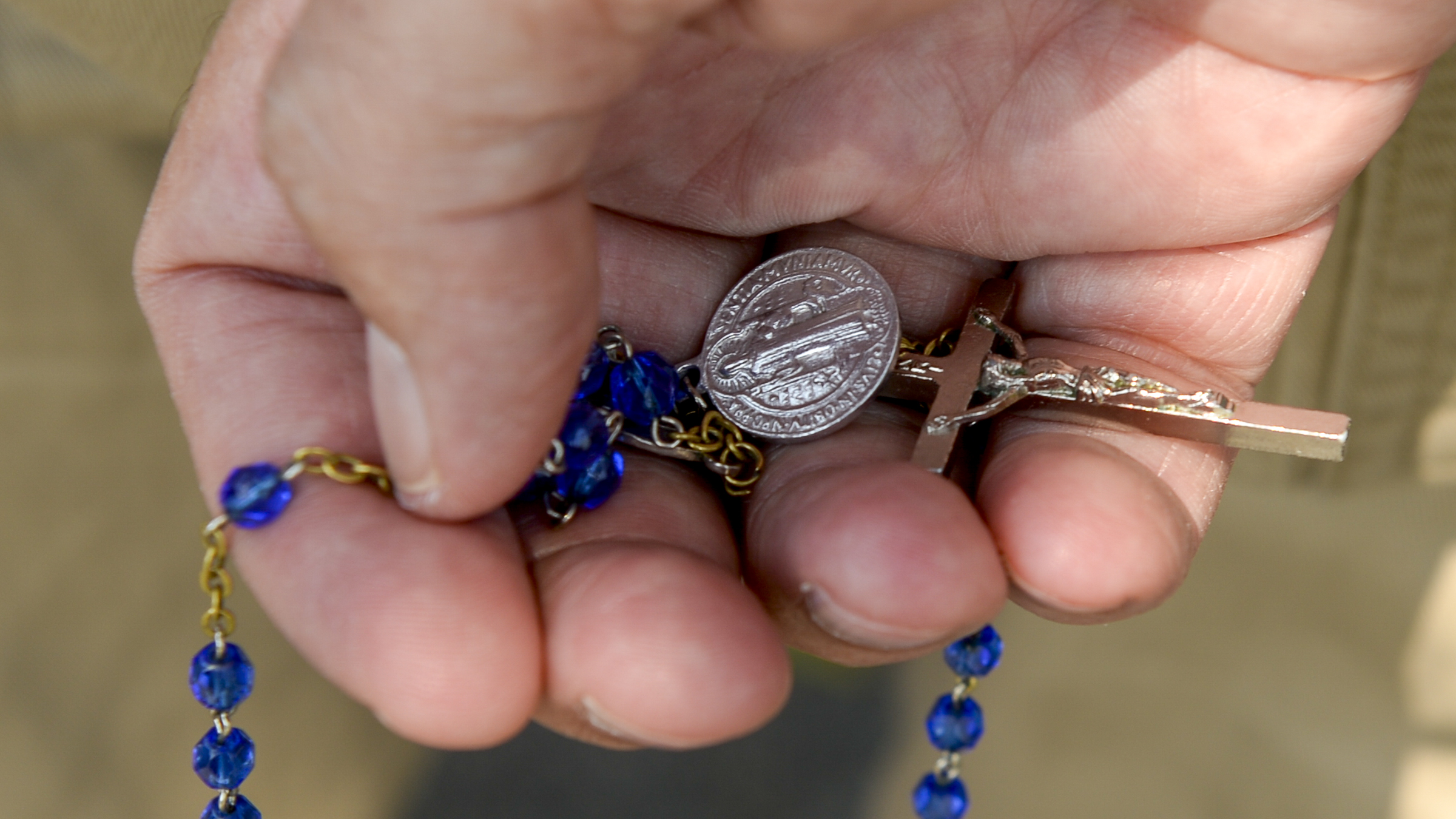 Leah Hogsten | The Salt Lake Tribune Catholic priest, Rev. Jan Bednarz of St. Martin de Porres Parish in Taylorsville, leads the "blessed sacrament" and exorcism at the Planned Parenthood offices on the Feast of the Assumption. Bednarz was joined by the group, "40 Days for Life Utah," to protest Planned Parenthood.