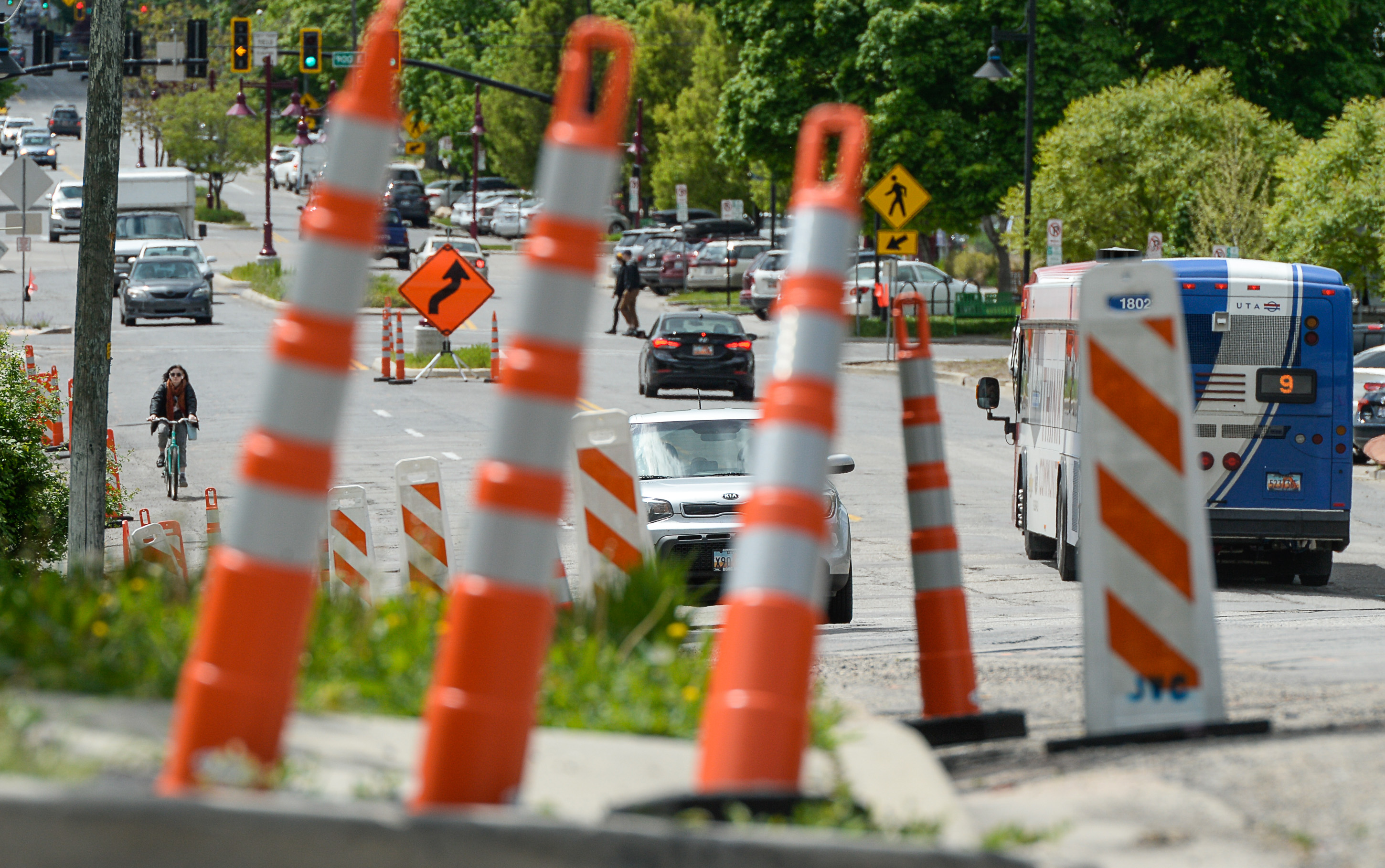 (Francisco Kjolseth | The Salt Lake Tribune) Traffic moves along a sea of orange as plans to repurpose 29 parking spaces between 950 East and 1300 East on 900 South in Salt Lake City causes some frustration from business owners and residents in the area.
