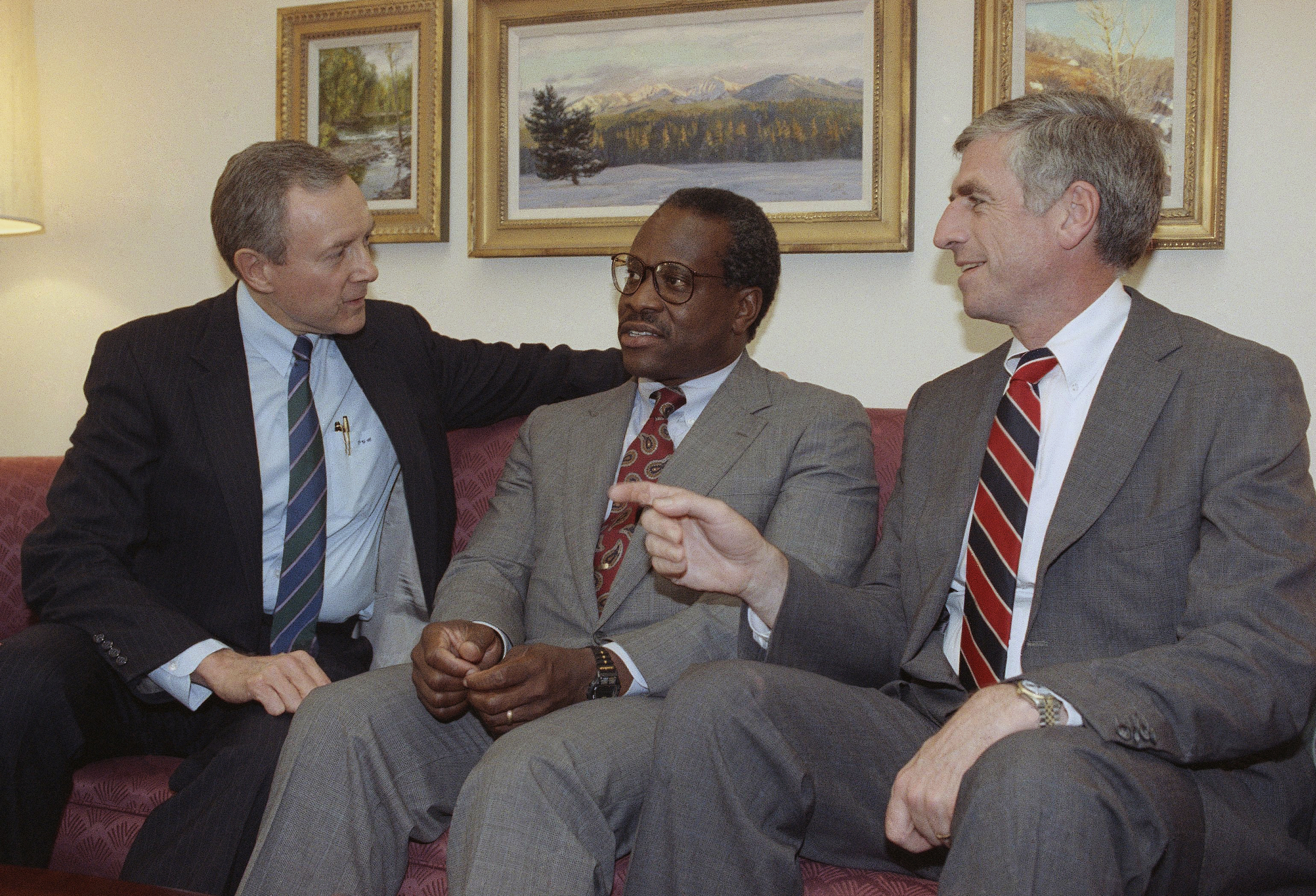 (John Duricka | AP Photo) Federal Judge Clarence Thomas, center, meets with Senators Orrin Hatch, R-Utah, left, and John Danforth, R-Missouri on Capitol Hill in Washington, Thursday, July 12, 1991. The post is subject to Senate confirmation.