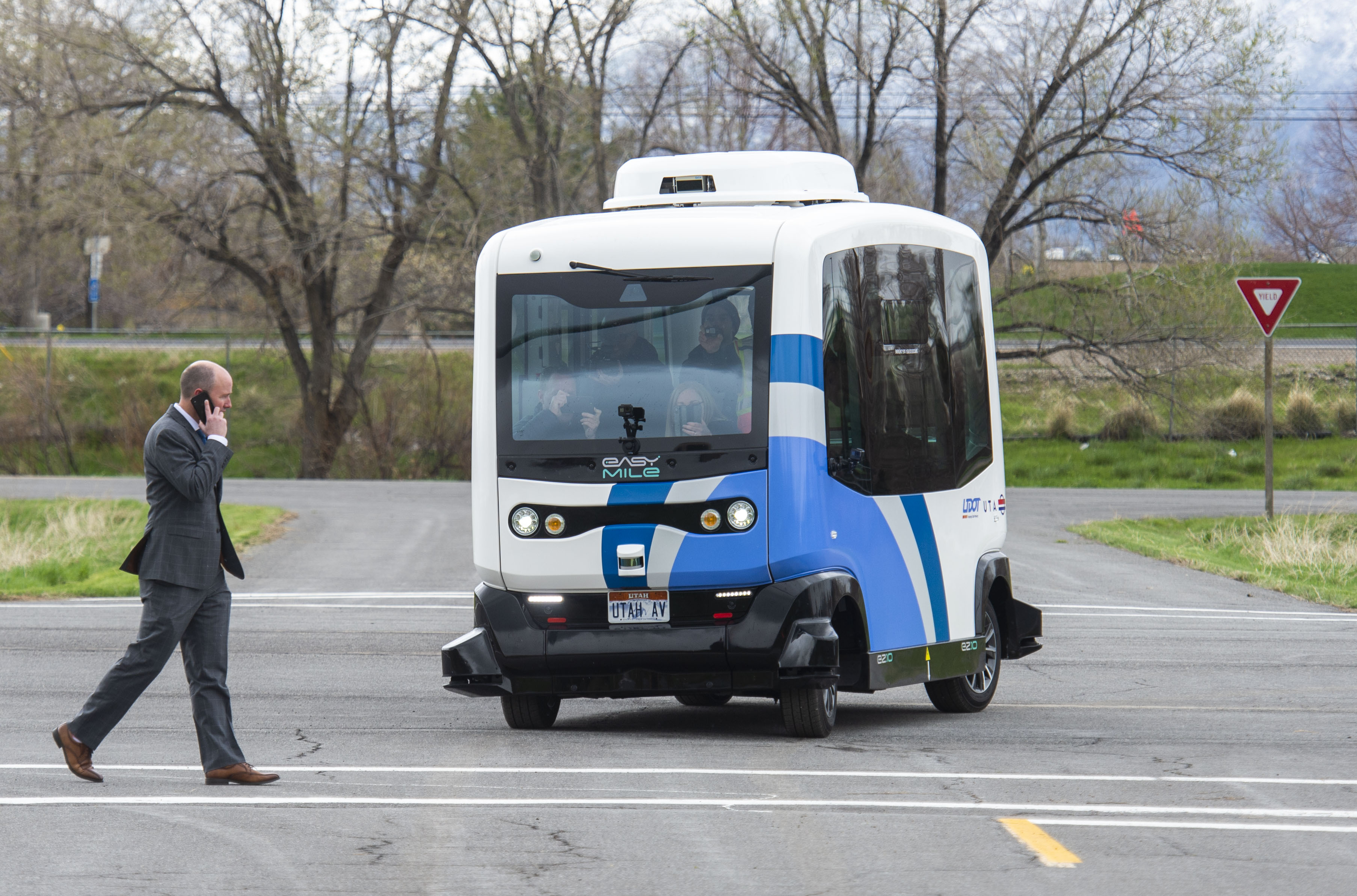 (Rick Egan | The Salt Lake Tribune) Lt. Governor Spencer J. Cox walks in front of an Autonomous Shuttle, to see if it will stop for him, during a demonstration as the Utah Department of Transportation, in partnership with the Utah Transit Authority, launched a new Autonomous Shuttle Pilot Project at the test track is across the street from UDOT headquarters on the west side of 2700 West. Thursday, April 11, 2019. 