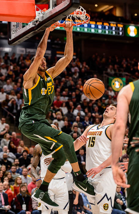 (Trent Nelson | The Salt Lake Tribune) Utah Jazz center Rudy Gobert (27) dunks over Denver Nuggets center Nikola Jokic (15) as the Utah Jazz host the Denver Nuggets, NBA basketball in Salt Lake City on Wednesday Jan. 23, 2019.