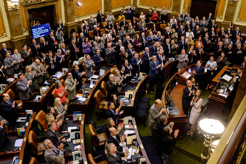 (Trent Nelson | The Salt Lake Tribune) A full House Chamber stands and applauds families who lost loved ones in law enforcement, military and public service as Governor Gary Herbert delivers his State of the State address at the Utah Capitol in Salt Lake City on Wednesday Jan. 30, 2019.