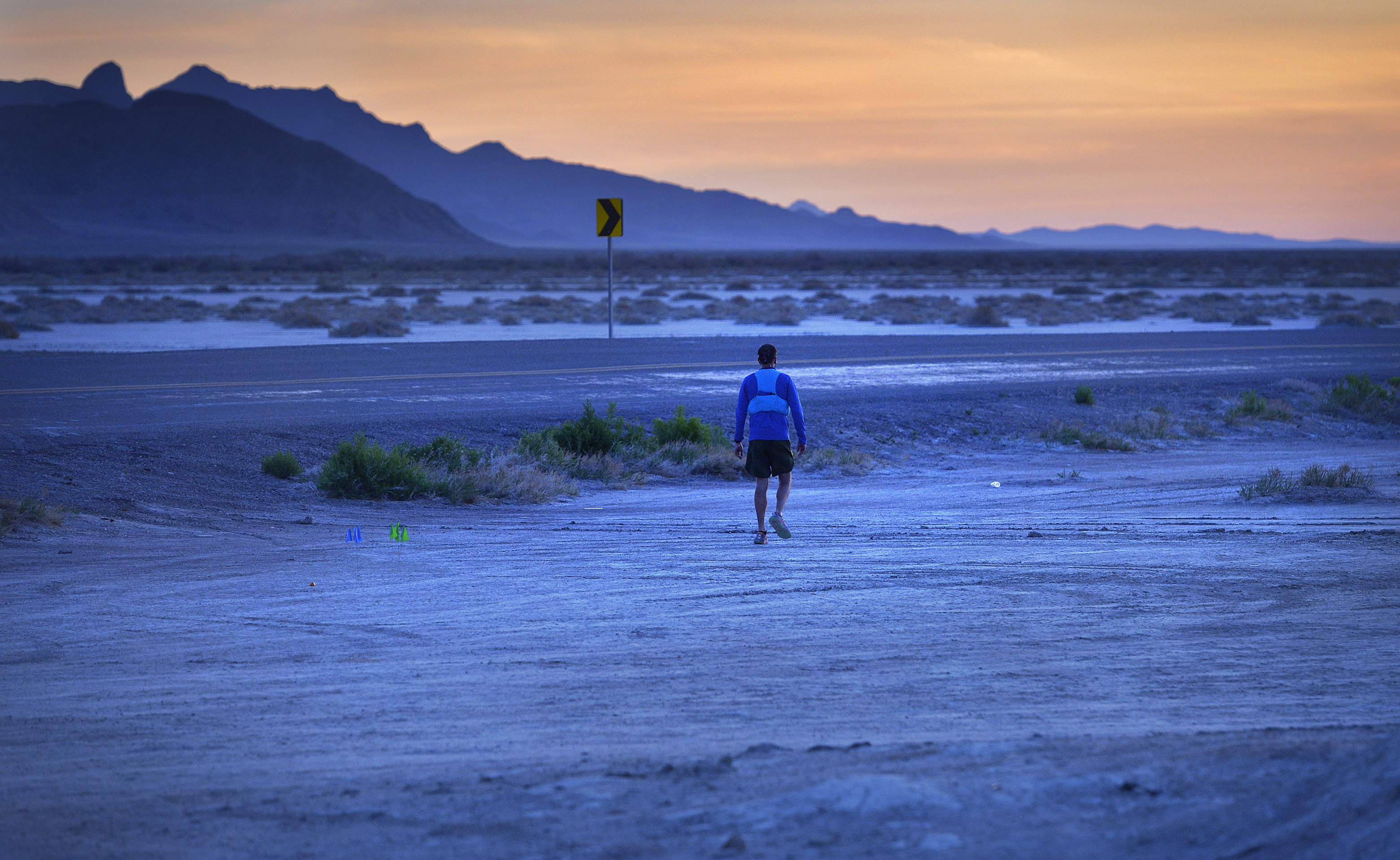 (Scott Sommerdorf | The Salt Lake Tribune) Alex Doolan sets out on the last 3.8 miles as the sun rises at the Salt Flats 100 Endurance Run, Saturday, May 5, 2018. Doolan finished the race in 8th place. 