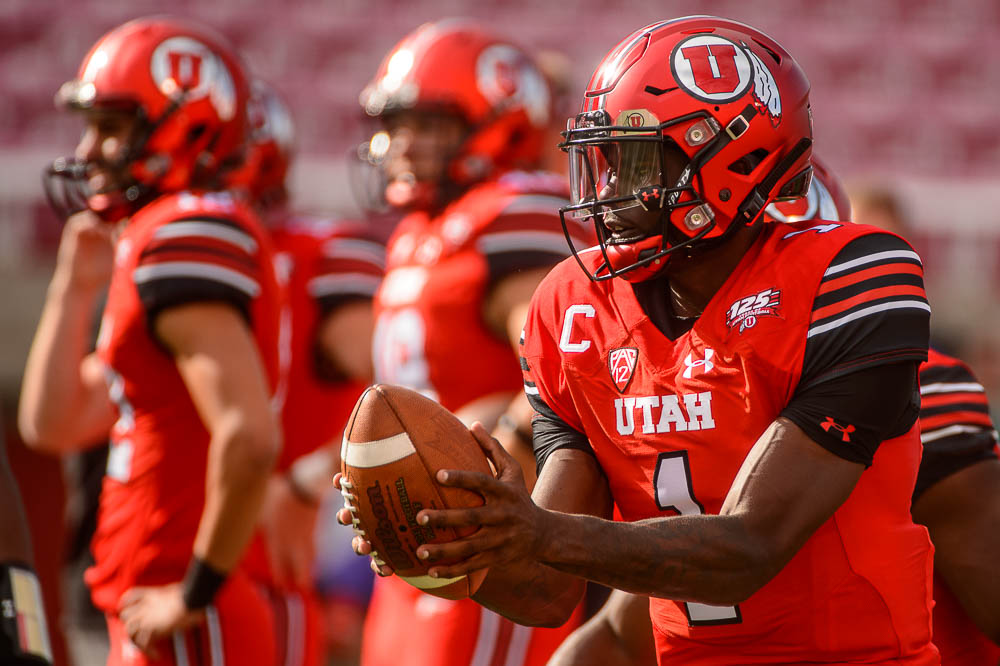 (Trent Nelson | The Salt Lake Tribune) Utah Utes quarterback Tyler Huntley (1) warms up as the University of Utah Utes host the Weber State Wildcats, Thursday Aug. 30, 2018 at Rice-Eccles Stadium in Salt Lake City.