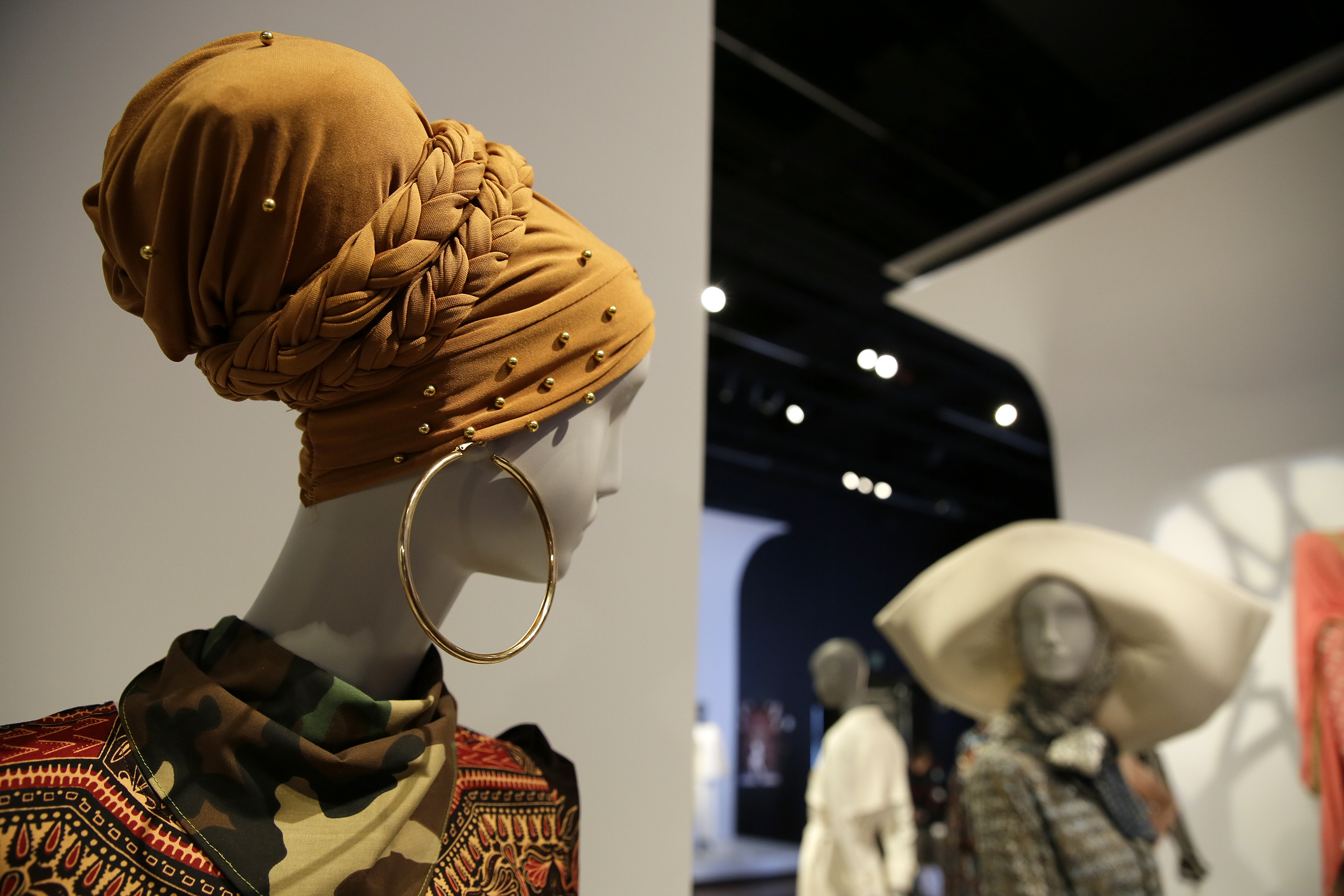 (Eric Risberg | AP Photo) In this photo taken Thursday, Sept. 20, 2018, a headscarf and wrap is displayed in the exhibit Contemporary Muslim Fashions at the M. H. de Young Memorial Museum in San Francisco. The first major museum exhibition of contemporary Muslim women's fashion reflects designs from around the world that are vibrant and elegant, playful and diverse. The show's creators hope the exhibit will show Muslim women as real people who can choose what they wear rather than as subjects ordered to cover their entire bodies or restricted in what they can wear. The exhibit opens on Saturday. 