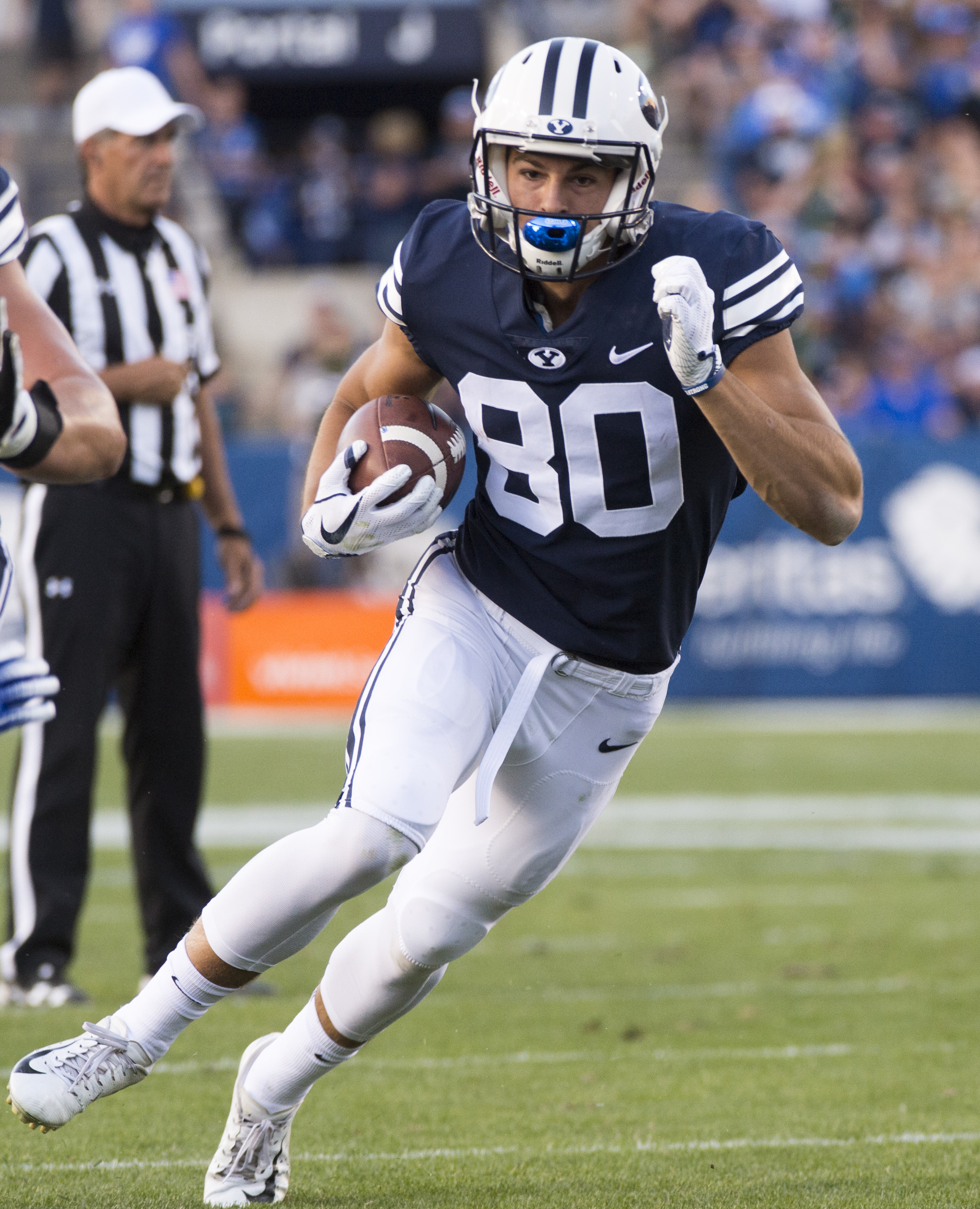 (Rick Egan | The Salt Lake Tribune) Brigham Young wide receiver Gunner Romney (80) runs the ball for the Cougars, in football action Brigham Young Cougars vs McNeese State Cowboys at Lavell Edwards Stadium, Saturday, Sept. 22, 2018. 