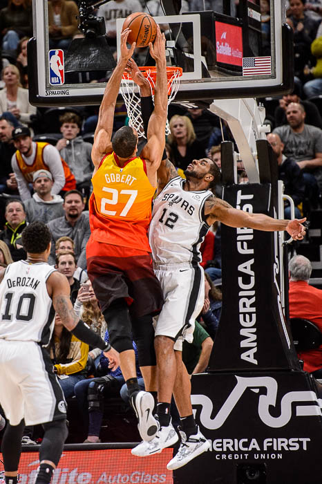 (Trent Nelson | The Salt Lake Tribune) Utah Jazz center Rudy Gobert (27) dunks over San Antonio Spurs center LaMarcus Aldridge (12) as the Utah Jazz host the San Antonio Spurs, NBA basketball in Salt Lake City on Saturday Feb. 9, 2019.