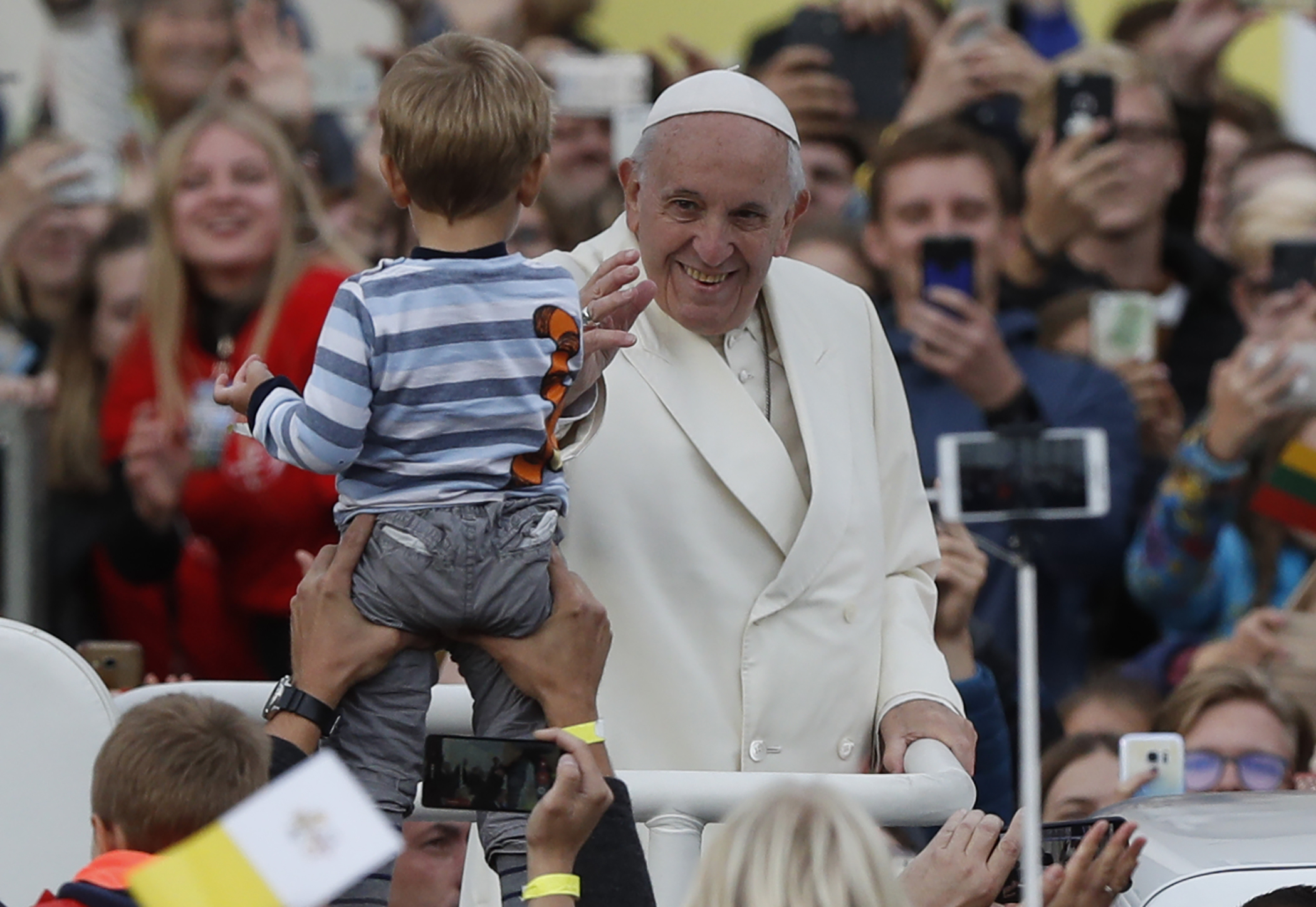 (Mindaugas Kulbis | AP Photo) Pope Francis greets the crowd on his Popemobile as he arrives for a meeting with youths at the Cathedral Square in Vilnius, Lithuania, Saturday Sept. 22, 2018. Pope Francis begins a four-day visit to the Baltics amid renewed alarm about Moscow's intentions in the region it has twice occupied.
