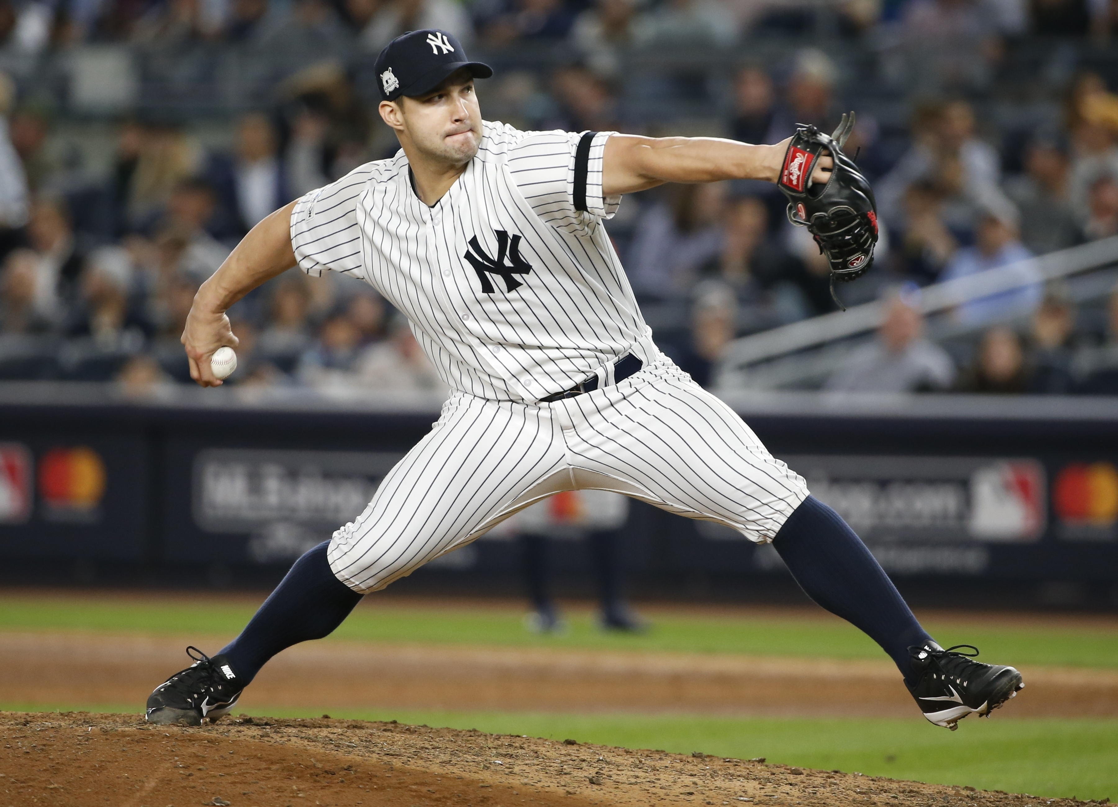 New York Yankees relief pitcher Tommy Kahnle throws during the eighth inning of Game 5 of baseball's American League Championship Series against the Houston Astros Wednesday, Oct. 18, 2017, in New York. (AP Photo/Kathy Willens)