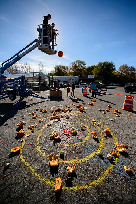 (Trent Nelson | The Salt Lake Tribune) A pumpkin is smashed at Glover Nursery in West Jordan on Saturday Nov. 3, 2018. The nursery held its annual pumpkin smash and food drive, dropping pumpkins from a cherry picker and collecting donations for the needy.