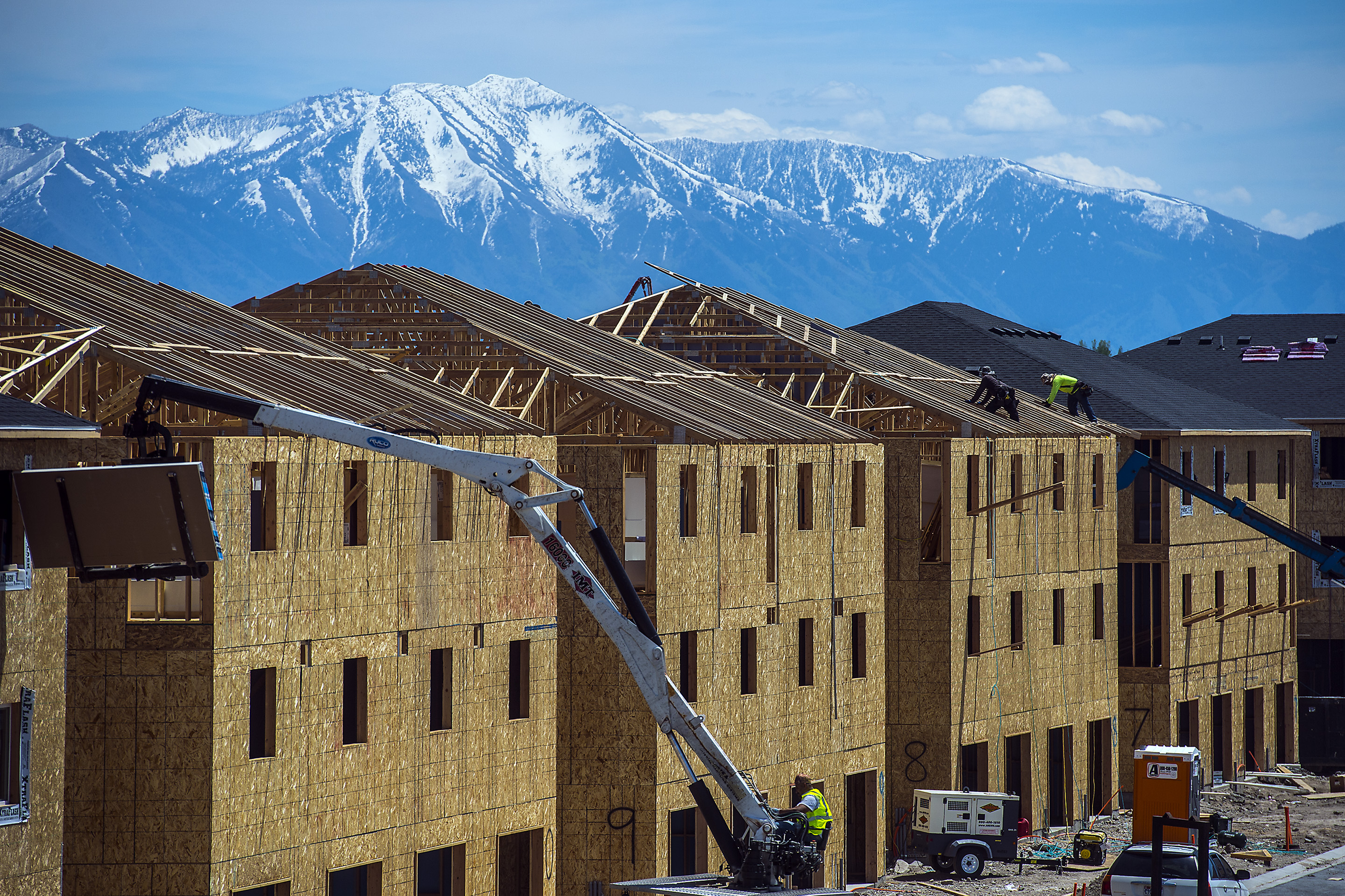 (Chris Detrick | Tribune file photo) Construction continues on new buildings in Vineyard City in Utah County, Tuesday, May 23, 2017. 