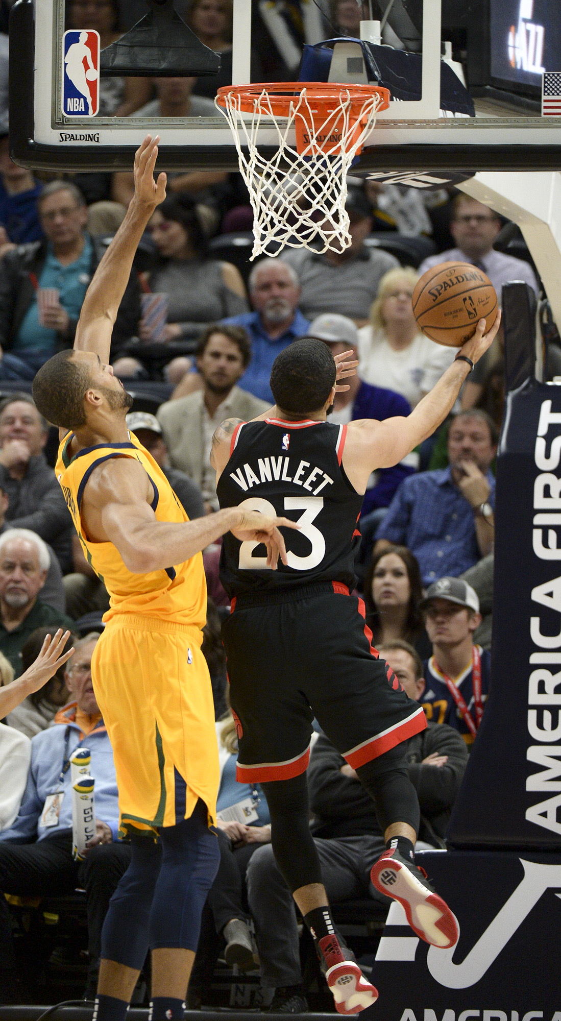Leah Hogsten | The Salt Lake Tribune Toronto Raptors guard Fred VanVleet (23) shoots around Utah Jazz center Rudy Gobert (27) as the Utah Jazz host the Toronto Raptors, Monday, Nov. 5, 2018 at Vivant Smart Home Arena.