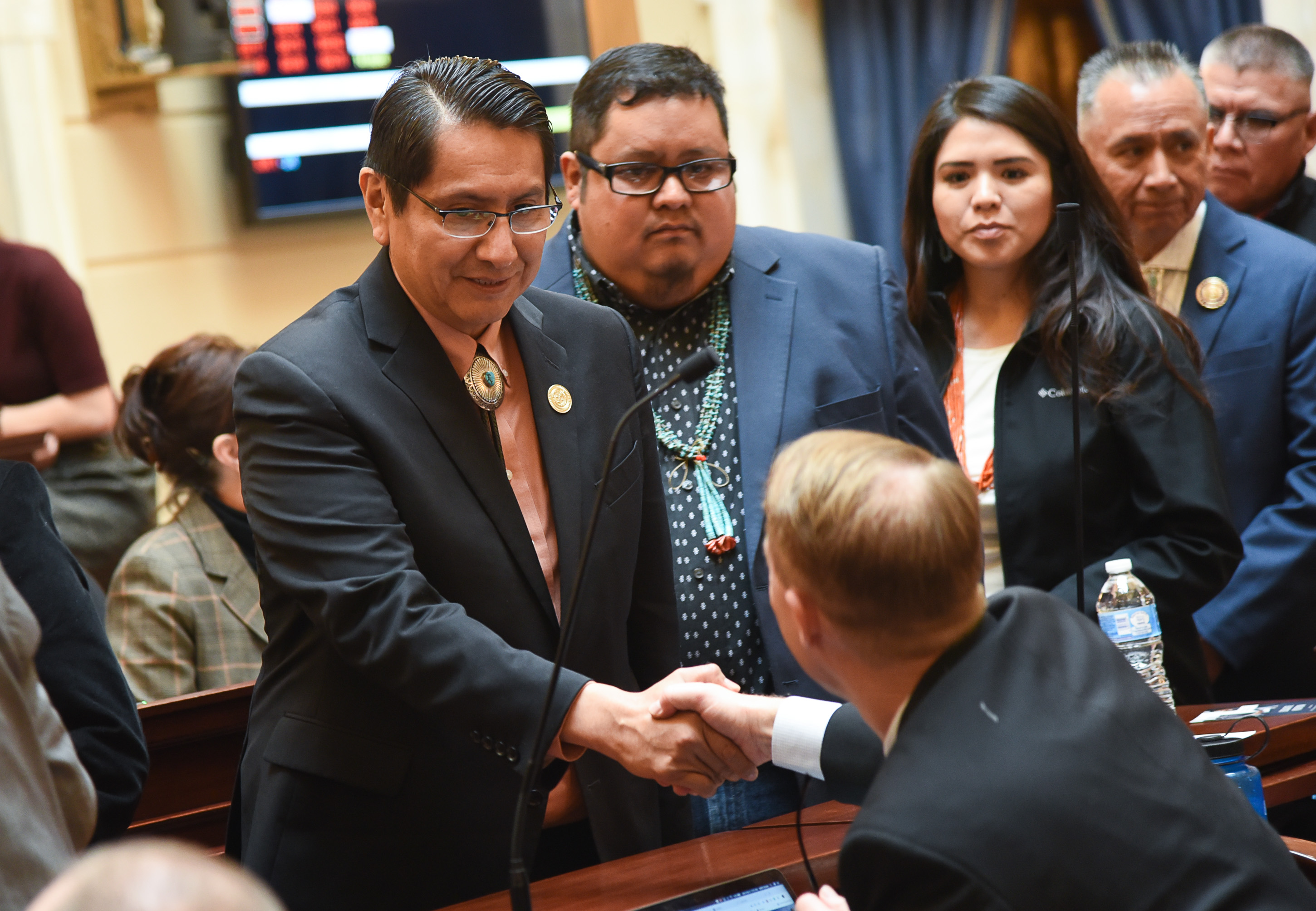 (Francisco Kjolseth | The Salt Lake Tribune) Navajo Nation President Jonathan Nez, shakes hands with state senators after Utah lawmakers on Monday unanimously passed a resolution honoring the Navajo code talkers and dedicating Aug. 14, 2019, to the World War II service members whose unbreakable code boosted the U.S. Marine Corps in the Pacific Theater.