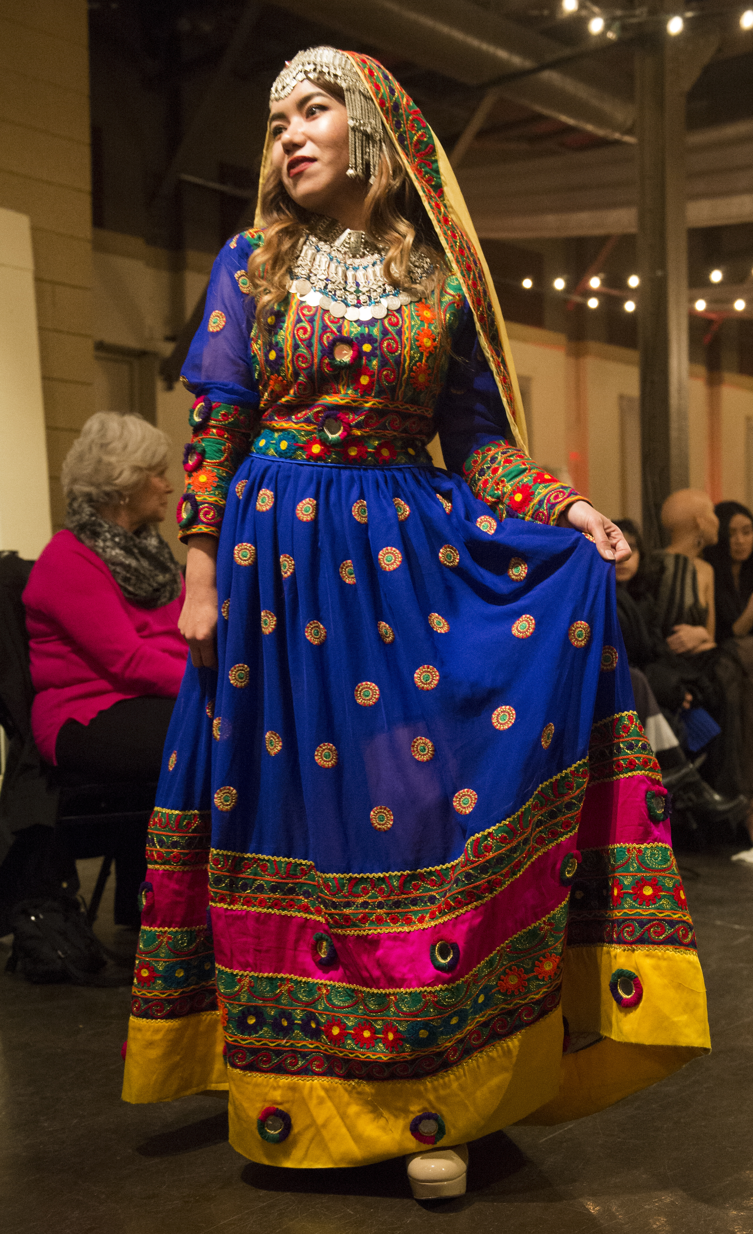 (Rick Egan | The Salt Lake Tribune) Golshan from Afghanistan walks the runway during the 8th Annual Women of the World Fashion Show. The fashion show fund is raiser for the non-profit that seeks to help refugees settle in a new culture. Wednesday, March 7, 2018. 