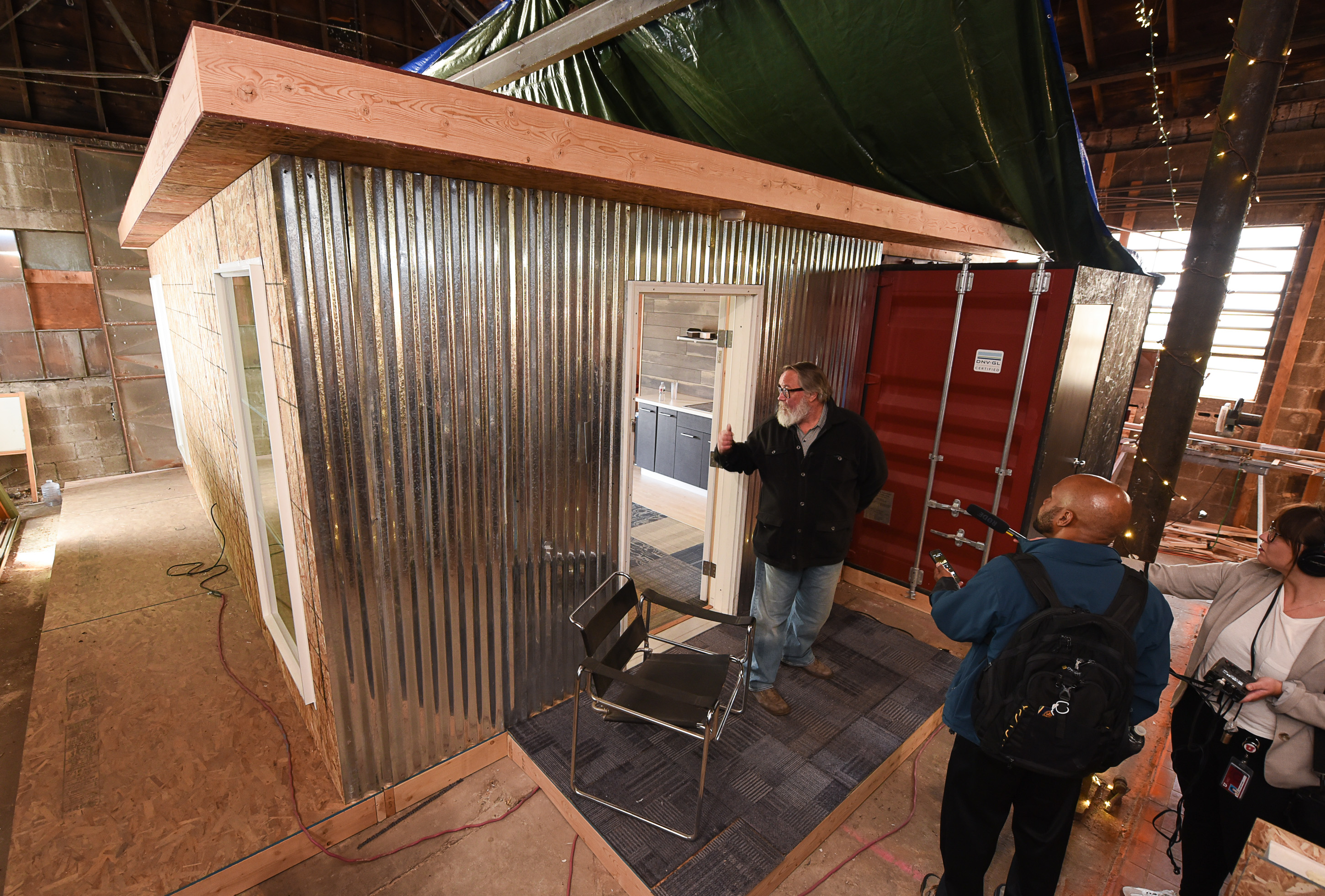 (Francisco Kjolseth | The Salt Lake Tribune) Our Homes, Our Voices, a campaign to bring more attention to the affordable housing crisis across the country showcases one of the solutions being presented by small house specialist Jeff White in Sat Lake City on Wed. May 2, 2018. White has been investing his time now for several years on shipping container prototypes, including a 432 square foot experimental home he built inside a warehouse in Salt Lake that would cost about $36,000 and be easy to assemble on a lot.