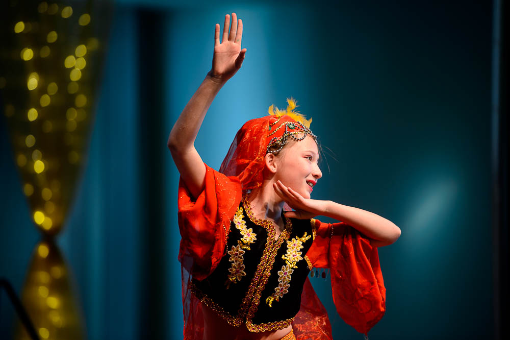 (Trent Nelson | The Salt Lake Tribune) Rebecca Rogness of the Leah Chinese Arts Dance School performs The Little Girl in the Flowers at the Chinese New Year Celebration at the County Library's Viridian Event Center in West Jordan, Saturday Feb. 17, 2018.