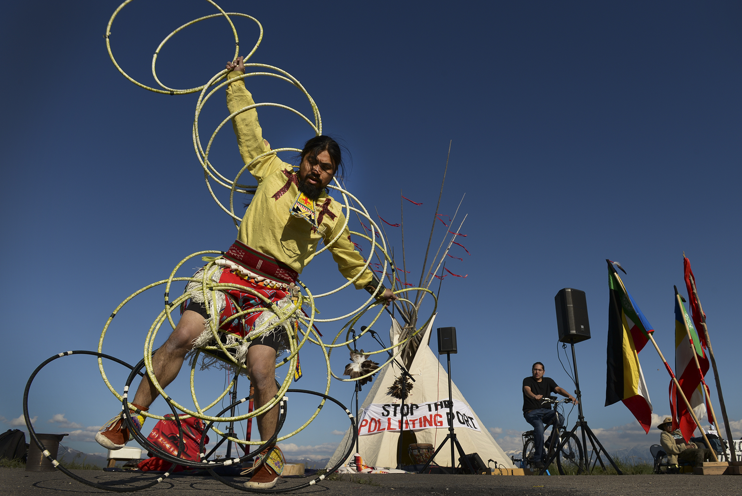 Leah Hogsten | The Salt Lake Tribune Carl Moore, a Hopi and Chemehuevi Native American performs a hoop dance in honor of Mother Earth. Moore also made offerings, sang and gave a prayer during the May Day celebration. The "Stop the Polluting Port" community coalition staged a May Day celebration, calling for respect and awareness of the water, earth and air regarding the 20,000 acres west of Salt Lake City where the inland port industrial site has been proposed.