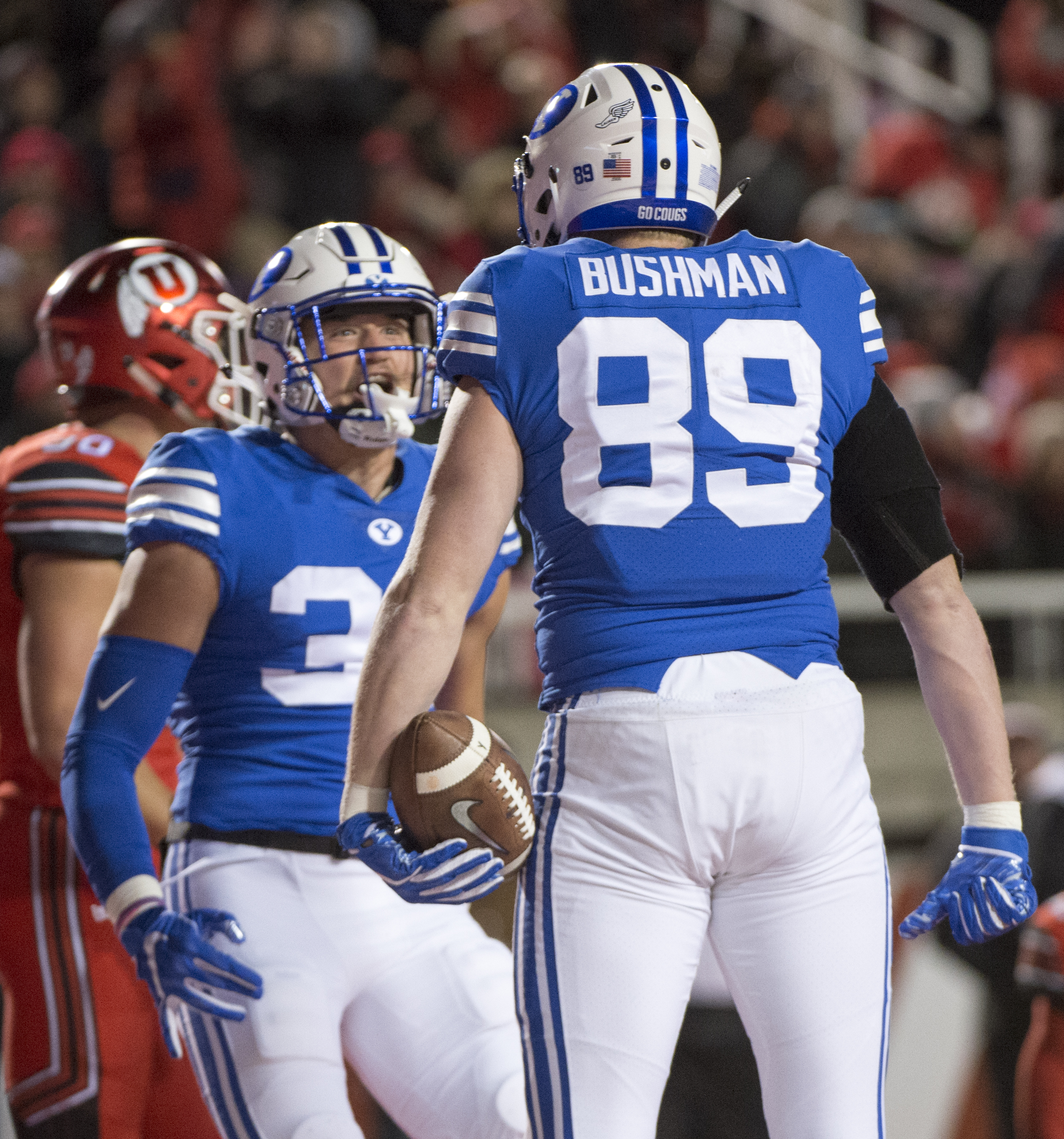 (Rick Egan | The Salt Lake Tribune) Brigham Young Cougars tight end Matt Bushman (89) celebrates his touchdown with Brigham Young Cougars tight end Dallin Holker (32), in football action between the Brigham Young Cougars and the Utah Utes, at Rice-Eccles Stadium, Saturday, November 24, 2018. 