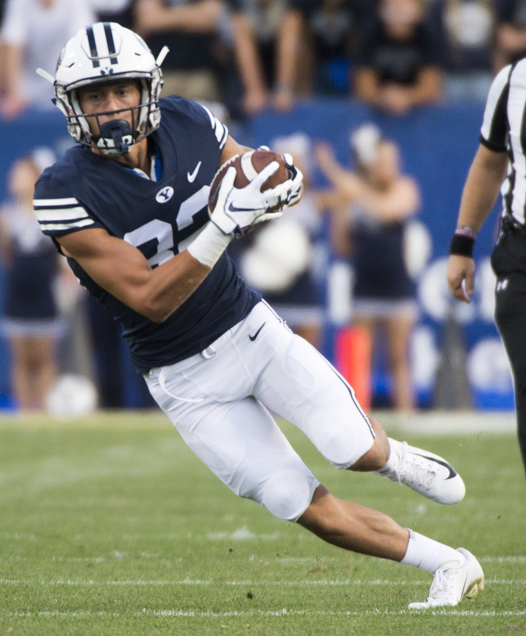 (Rick Egan | The Salt Lake Tribune) Brigham Young wide receiver Dax Milne (82) runs the ball for the Cougars, in football action Brigham Young Cougars vs McNeese State Cowboys at Lavell Edwards Stadium, Saturday, Sept. 22, 2018. 