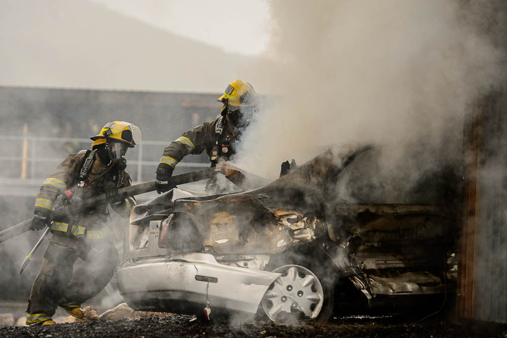 (Trent Nelson | The Salt Lake Tribune) Unified Fire recruits in a live response to a vehicle and structure fire at the Unified Fire Authority Training Center in Magna on Tuesday April 16, 2019.