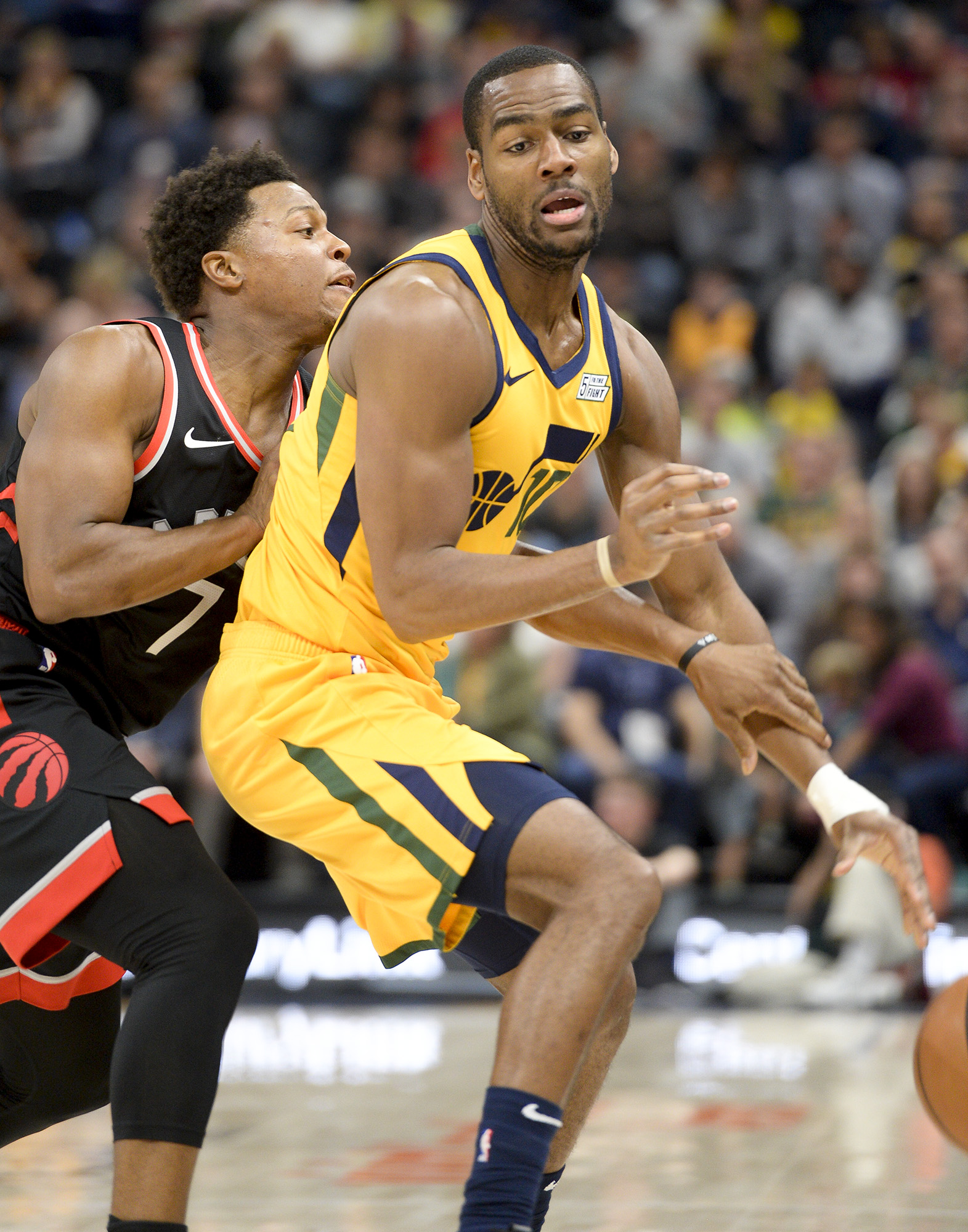 Leah Hogsten | The Salt Lake Tribune Toronto Raptors guard Kyle Lowry (7) tries to steal from Utah Jazz guard Alec Burks (10)as the Utah Jazz host the Toronto Raptors, Monday, Nov. 5, 2018 at Vivant Smart Home Arena.