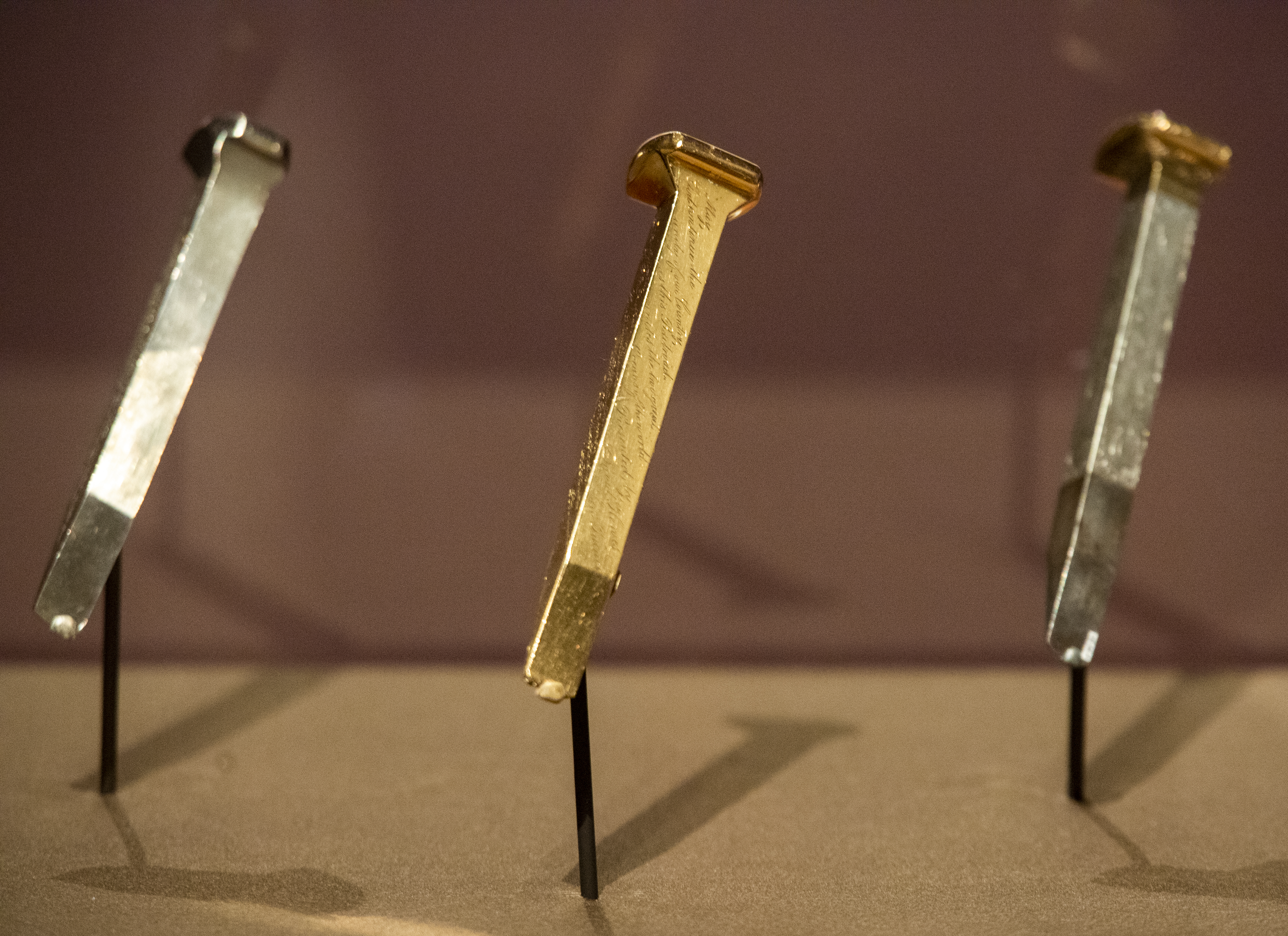 (Rick Egan | The Salt Lake Tribune) Three of the spikes that were used at the ceremonial completion of the trans-continental railroad in 1869 are on display at the Utah Museum of Fine Arts. Thursday, Jan. 31, 2019. 