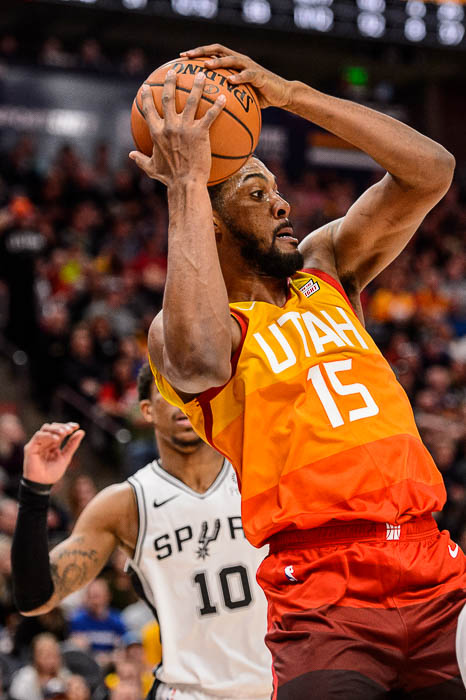 (Trent Nelson | The Salt Lake Tribune) Utah Jazz forward Derrick Favors (15) rebounds as the Utah Jazz host the San Antonio Spurs, NBA basketball in Salt Lake City on Saturday Feb. 9, 2019.