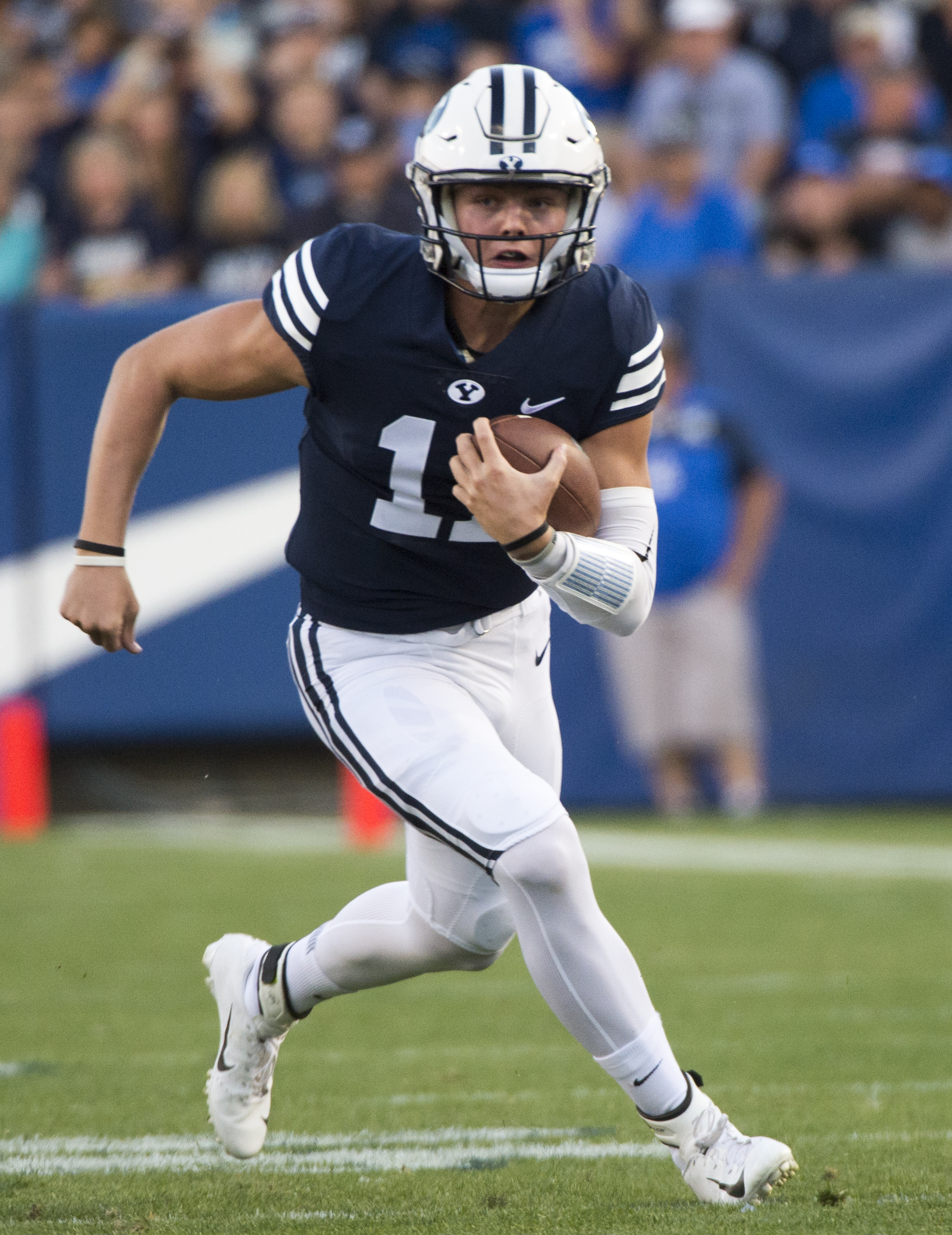 (Rick Egan | The Salt Lake Tribune) Brigham Young Cougars quarterback Zach Wilson (11) looks at the clock before taking a knee on the 5 hardline instead of trying to score in the final minute of the game as the Brigham Young Cougars led the McNeese State Cowboys 30-3, at Lavell Edwards Stadium, Saturday, Sept. 22, 2018. 