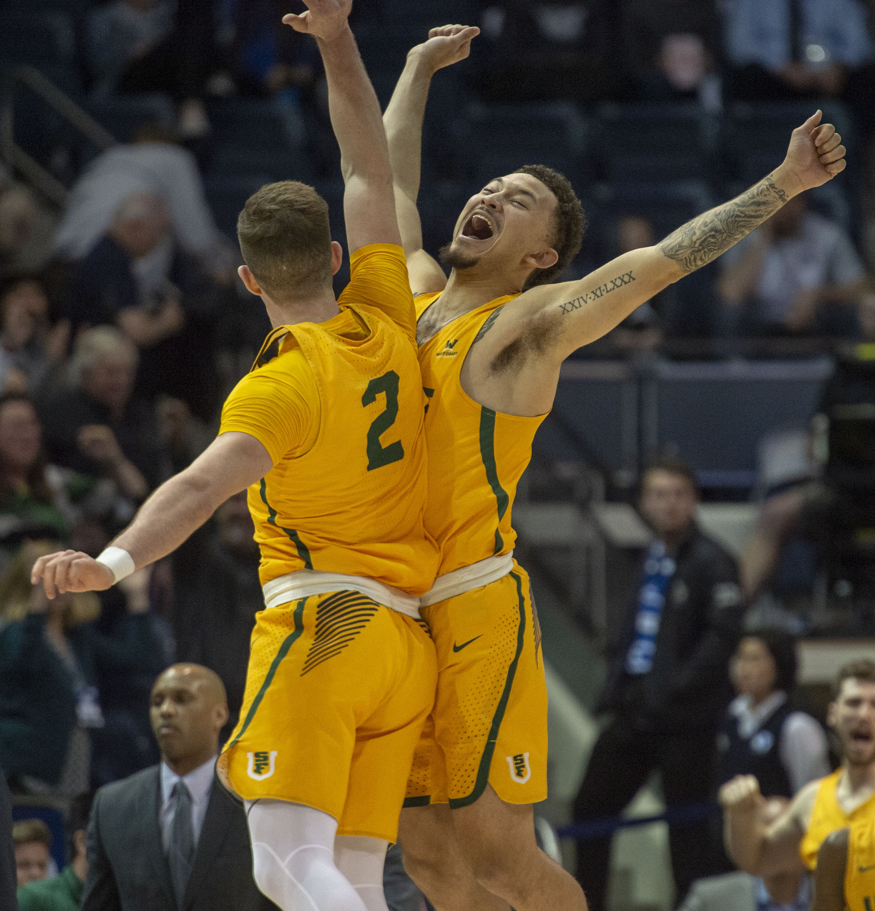 (Rick Egan | The Salt Lake Tribune) San Francisco Dons guard Frankie Ferrari (2) AND San Francisco Dons guard Trevante Anderson (12) celebrate San Francisco Dons 77-71 win over BYU, in WCC basketball action at the Marriott Center, Thursday, February 21, 2018. 