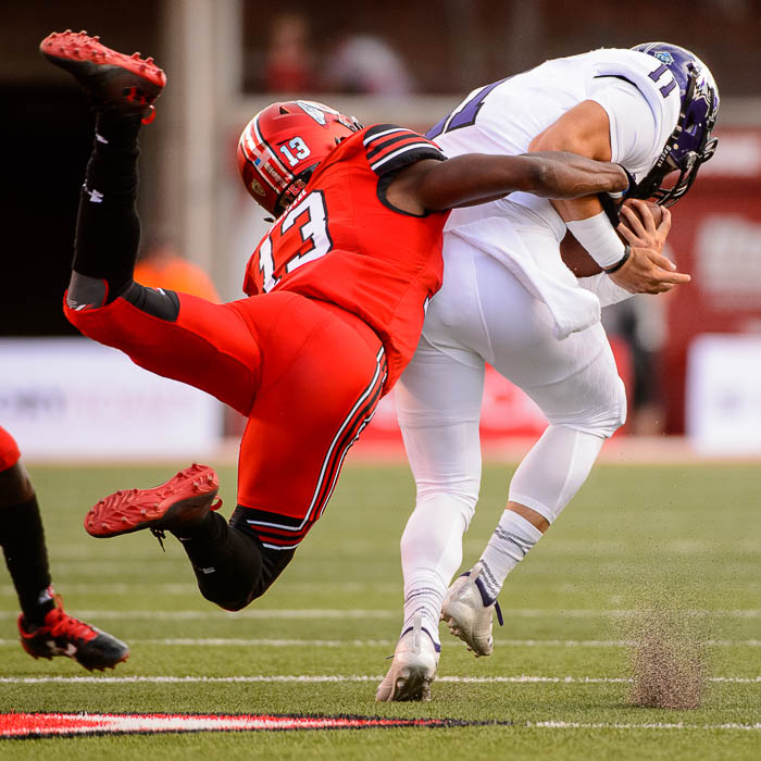 (Trent Nelson | The Salt Lake Tribune) Utah Utes defensive back Marquise Blair (13) brings down Weber State Wildcats quarterback Kaden Jenks (11) as the University of Utah Utes host the Weber State Wildcats, Thursday Aug. 30, 2018 at Rice-Eccles Stadium in Salt Lake City.