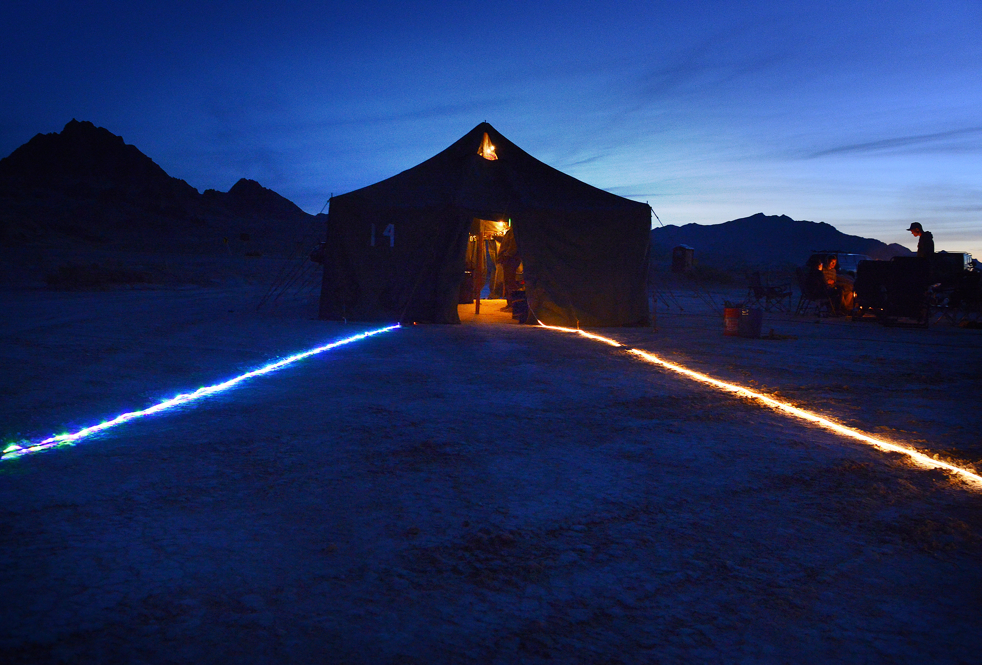 (Scott Sommerdorf | The Salt Lake Tribune) Light strips on the salt light the way to Aid Station 14 - the last checkpoint before the finish line - at the Salt Flats 100 Endurance Run, Saturday, May 5, 2018. 