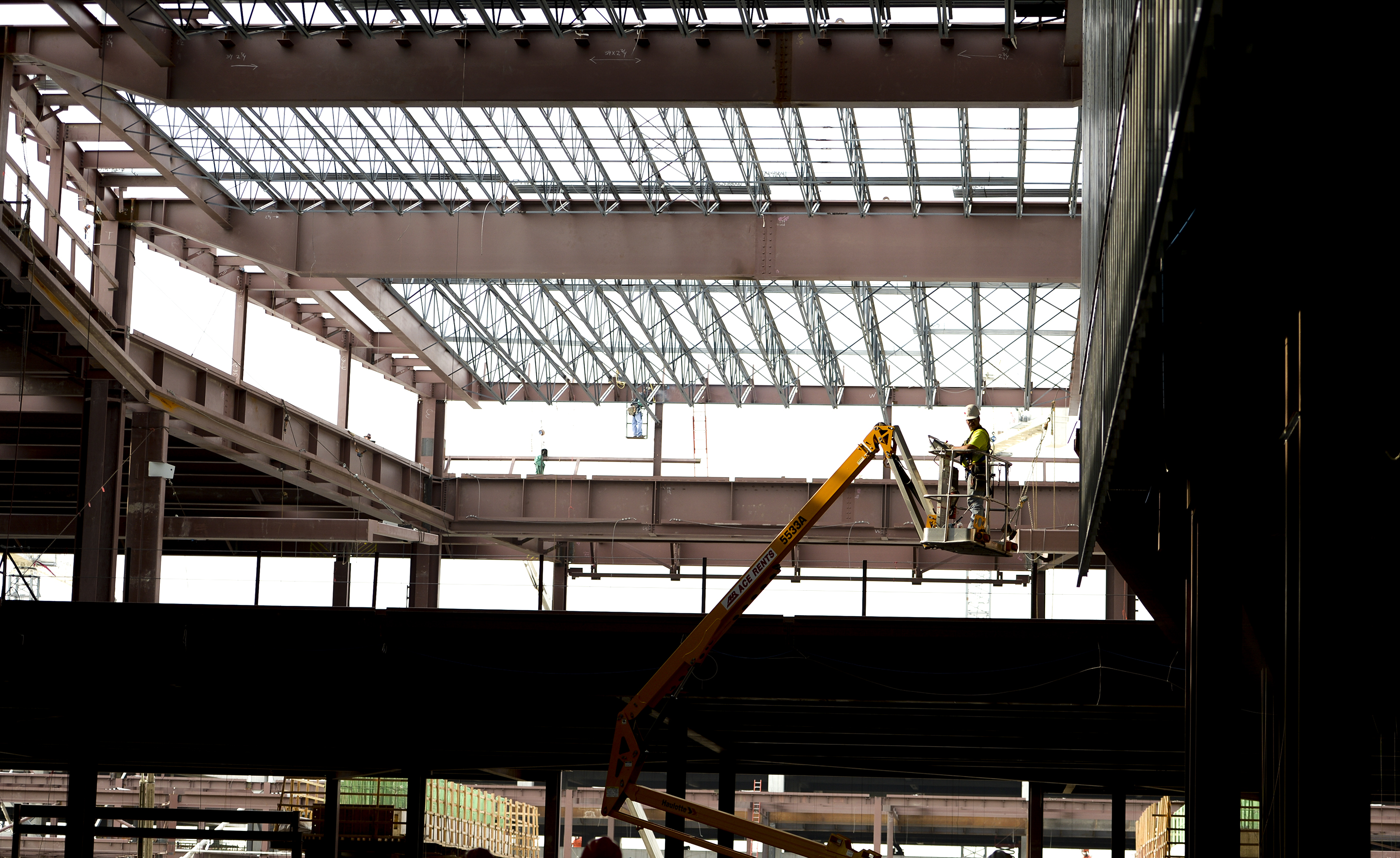 Leah Hogsten | The Salt Lake Tribune Salt Lake City International Airport's first phase construction of the $3.6 billion project is hitting the halfway mark Ñ and large new buildings and elevated roadways are more easily seen. Nearing completion is the new concourse for aircraft gates, an enclosed new terminal, the steel skeleton of a new ÒgatewayÓ building, a new five-story parking garage and elevated roadways. 