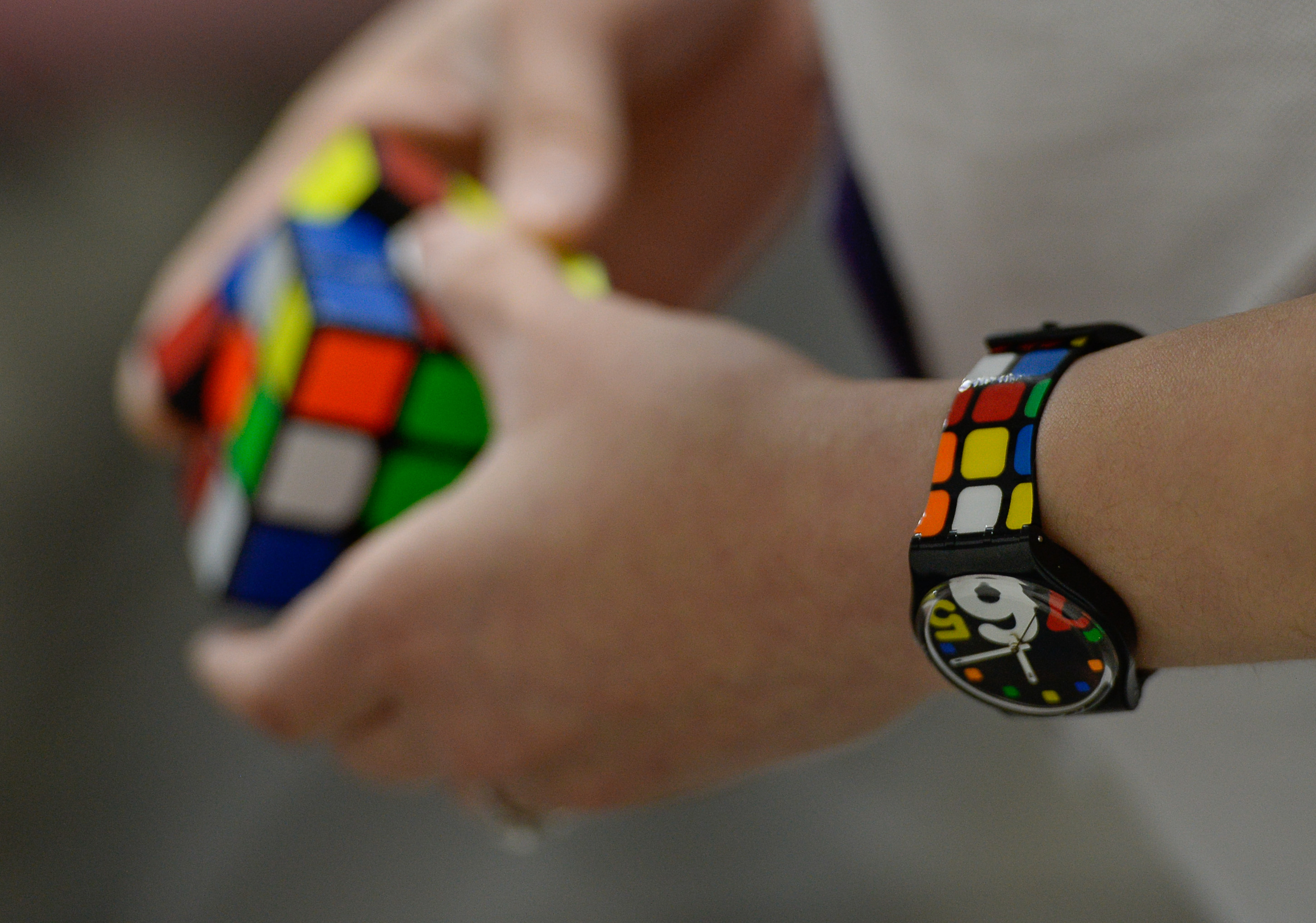 (Francisco Kjolseth | The Salt Lake Tribune) Shelley Chang of San Francisco spins her cube as she talks about her interest in cubing, saying "so in 2005 I was the first female woman to solve 3x3 blindfolded and was basically the fastest. I held that tile for about 10 years just because there were so few women." Chang was one of the volunteers helping during the CubingUSA Nationals 2018 at the Salt Palace Convention Center in Salt Lake City on Saturday, July 28, 2018.
