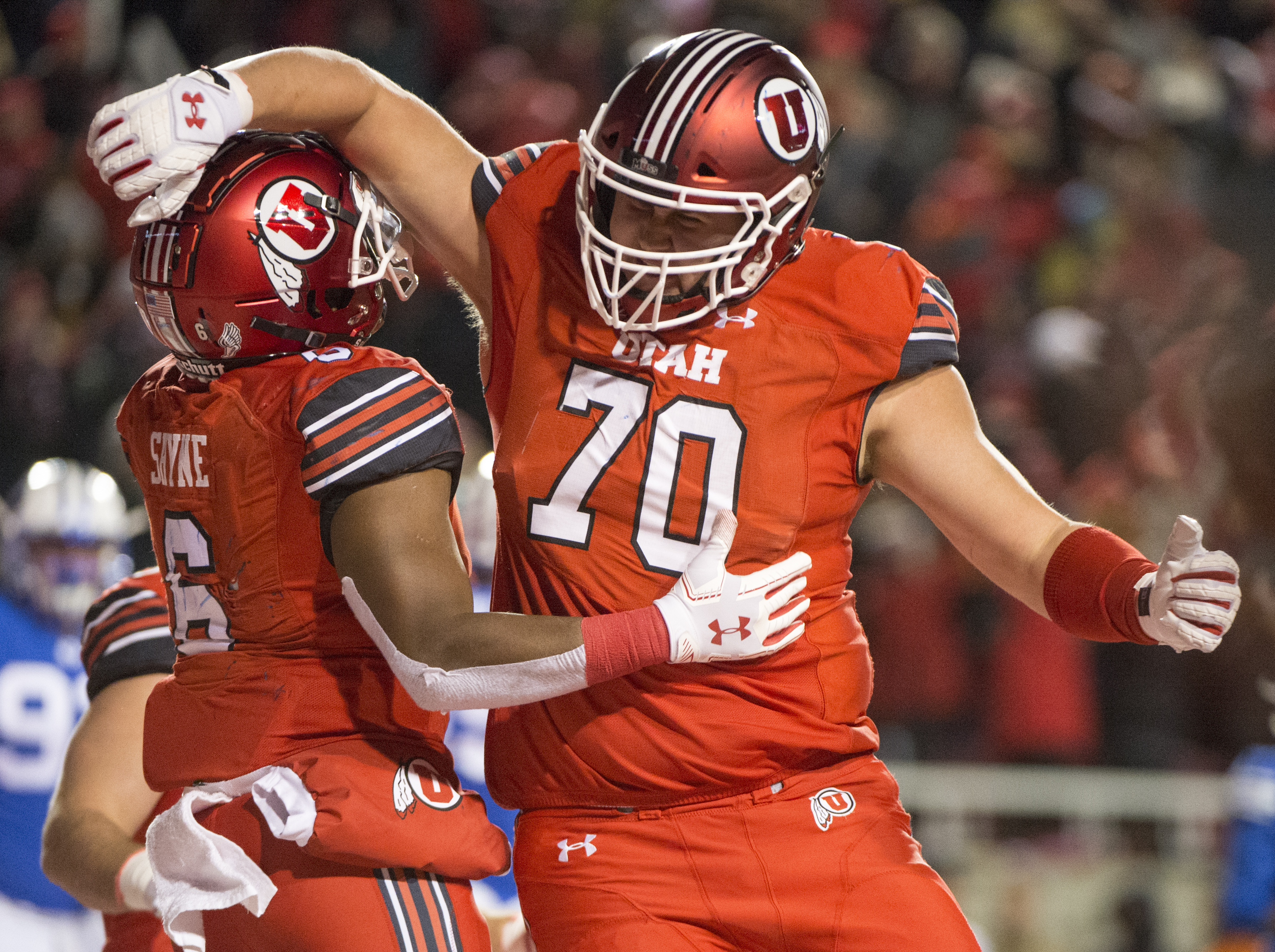 (Rick Egan | The Salt Lake Tribune) Utah Utes running back Armand Shyne (6) celebrates with Utah Utes offensive lineman Jackson Barton (70), after scoring a touchdown late in the 4th quarter, tying the score at 27-27, in football action between the Brigham Young Cougars and the Utah Utes, at Rice-Eccles Stadium, Saturday, November 24, 2018. 