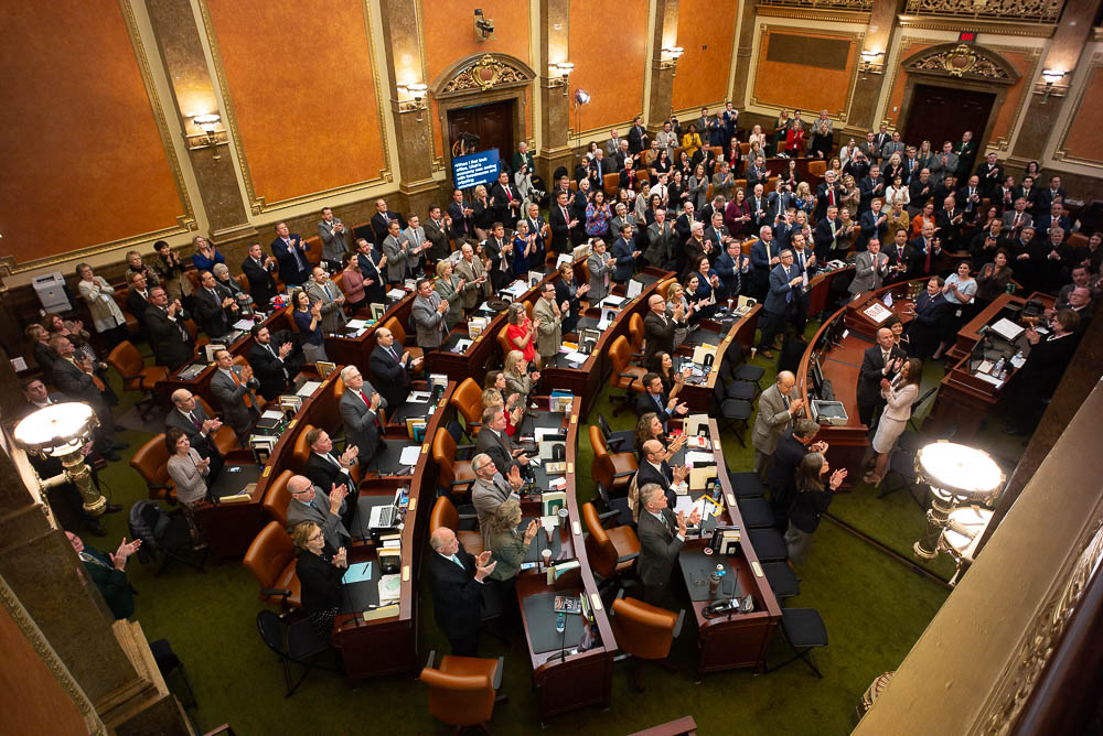 (Trent Nelson | The Salt Lake Tribune) A full House Chamber stands and applauds families who lost loved ones in law enforcement, military and public service as Governor Gary Herbert delivers his State of the State address at the Utah Capitol in Salt Lake City on Wednesday Jan. 30, 2019.