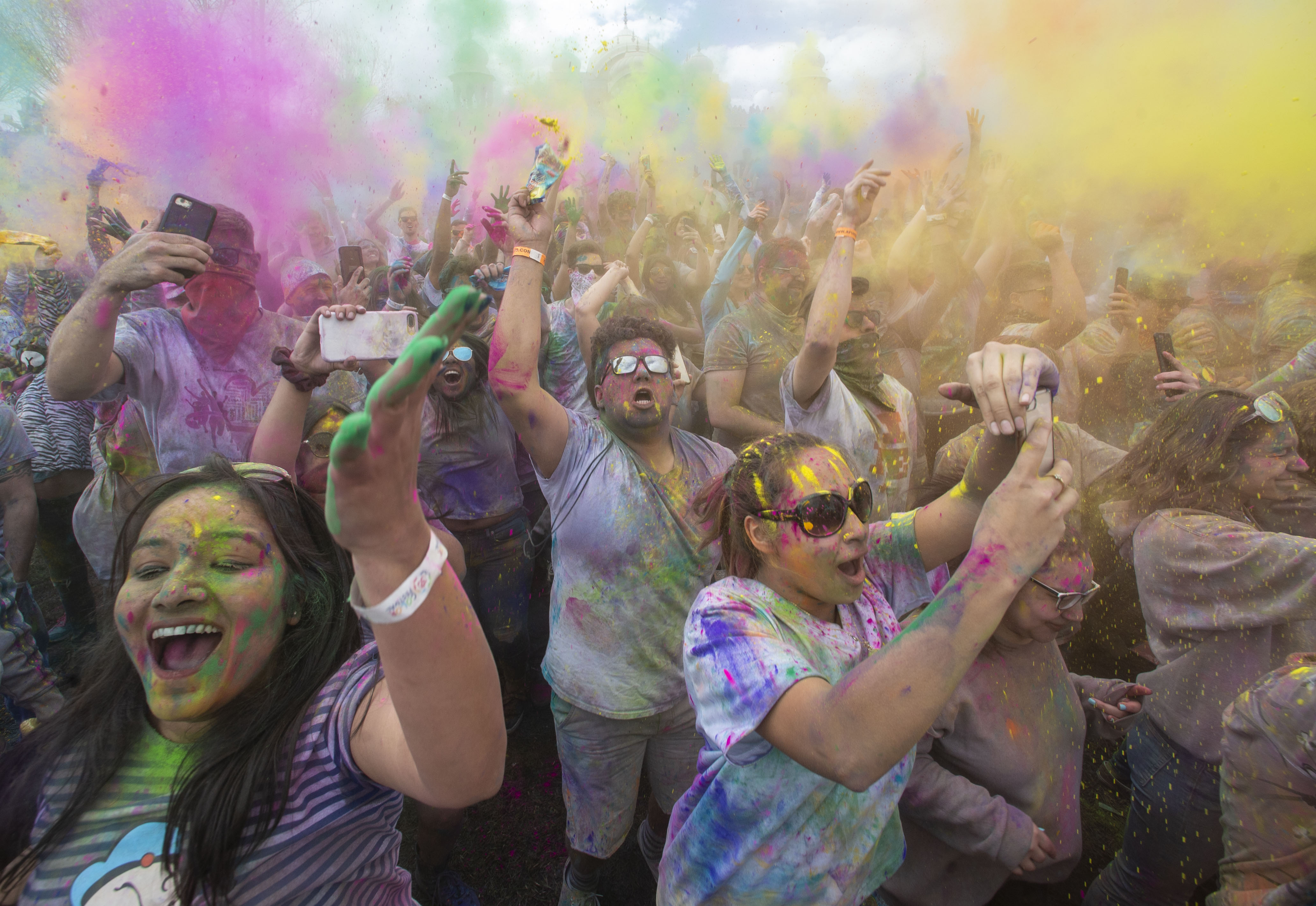 (Rick Egan | The Salt Lake Tribune) Revelers dance along with the Bollywood Utah dancers, at the Holi Festival of Colors celebration at the Sri Sri Radha Krishna Temple in Spanish Fork, Saturday, March 30, 2019. 